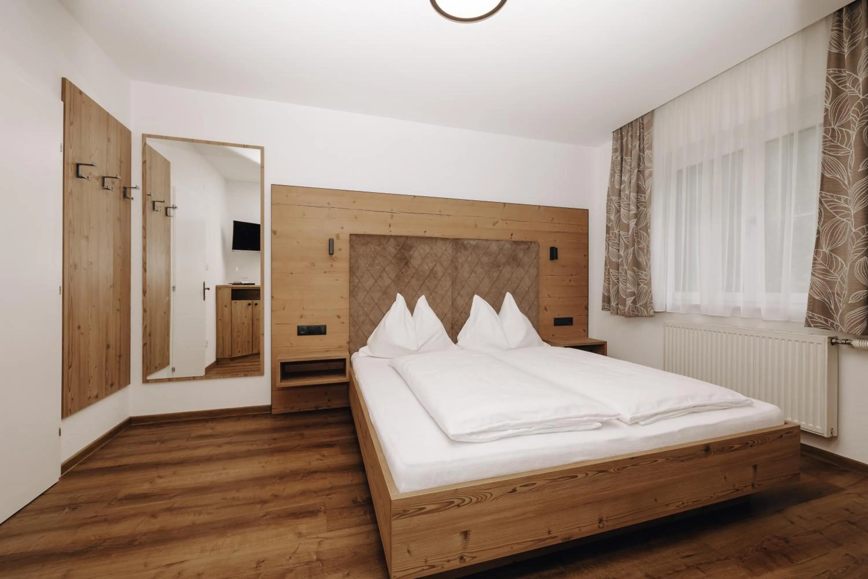 Bed in Hotel Garni Tannenhof