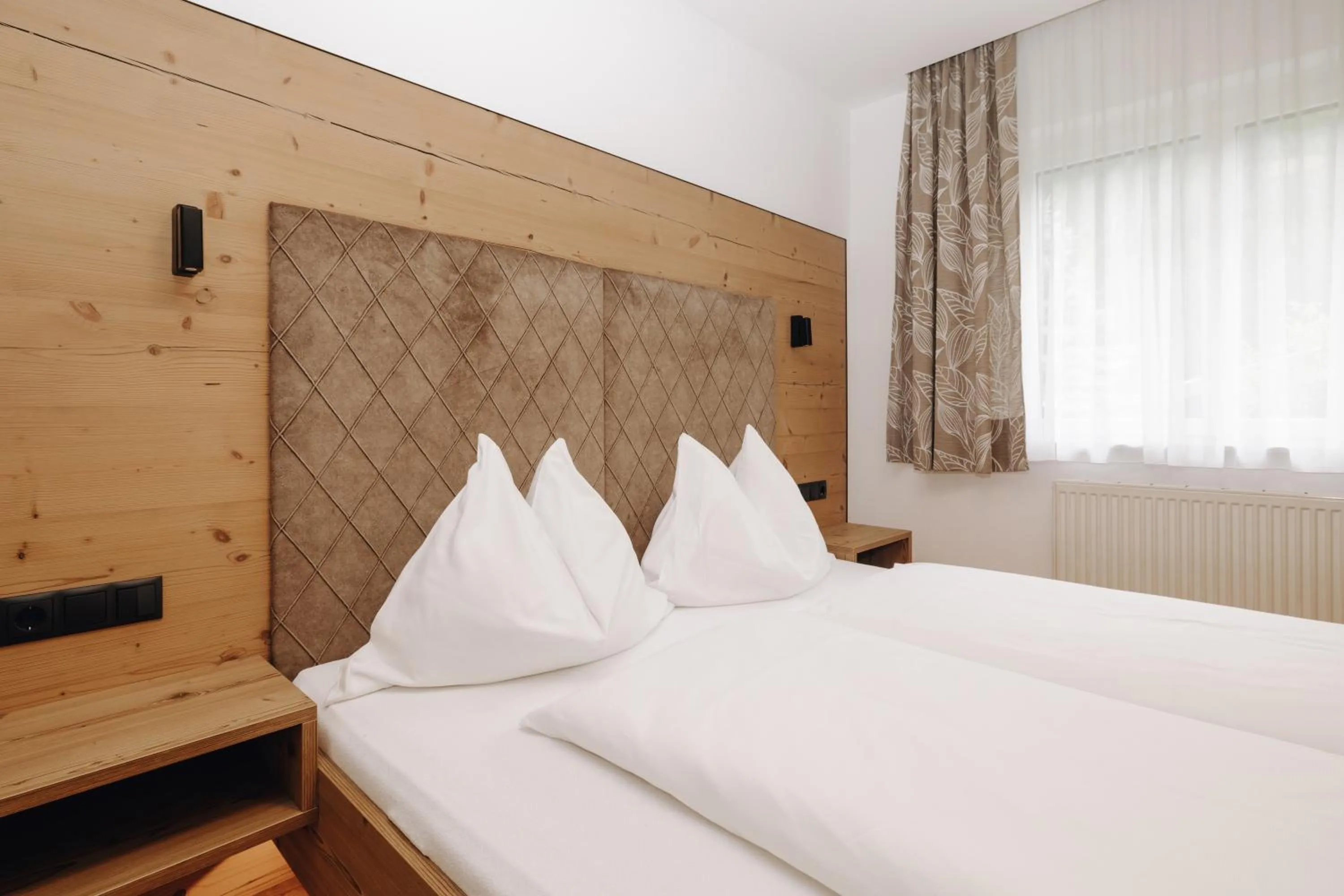 Bed in Hotel Garni Tannenhof