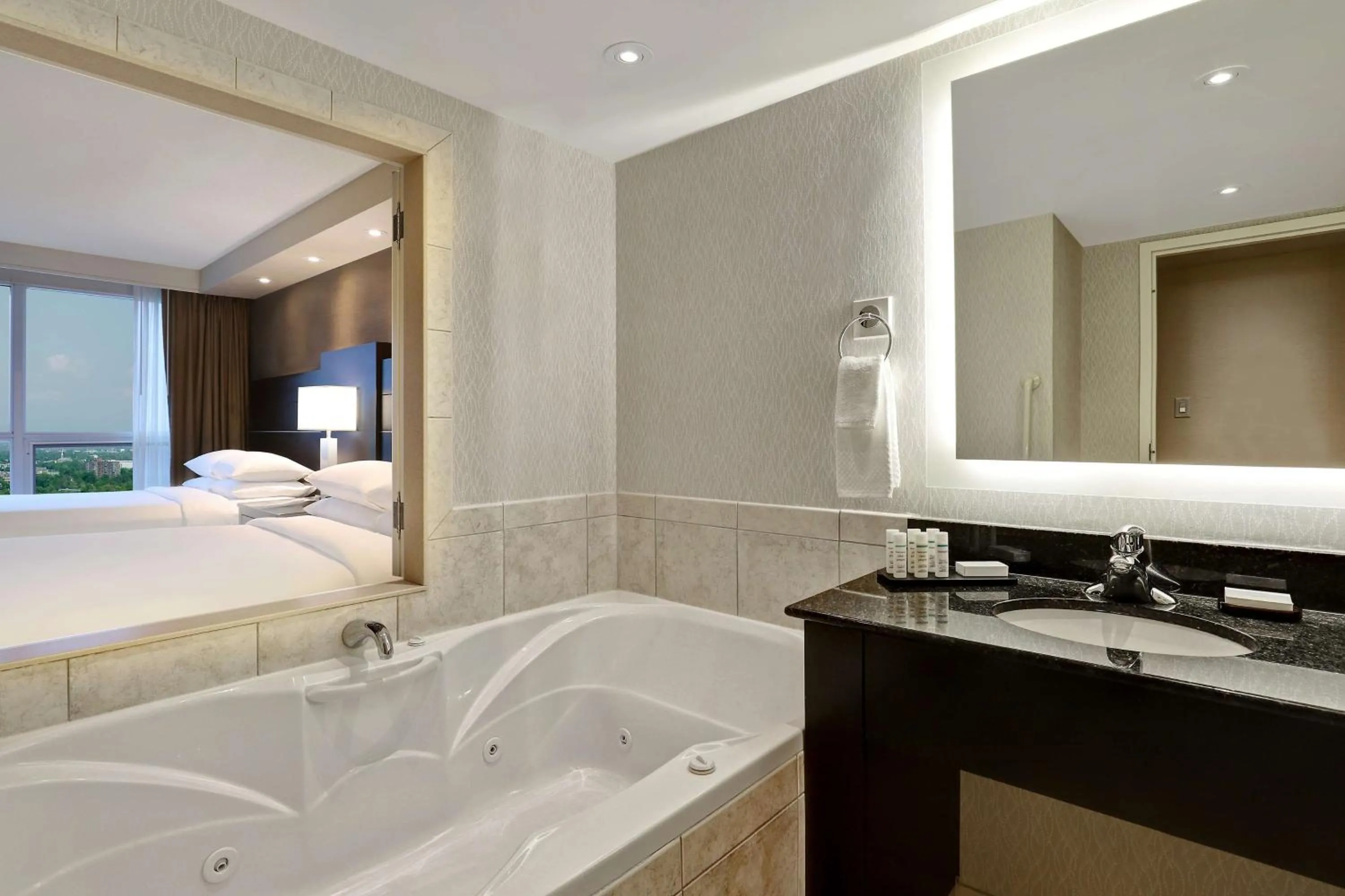 Bathroom, Bed in Embassy Suites by Hilton Niagara Falls/ Fallsview