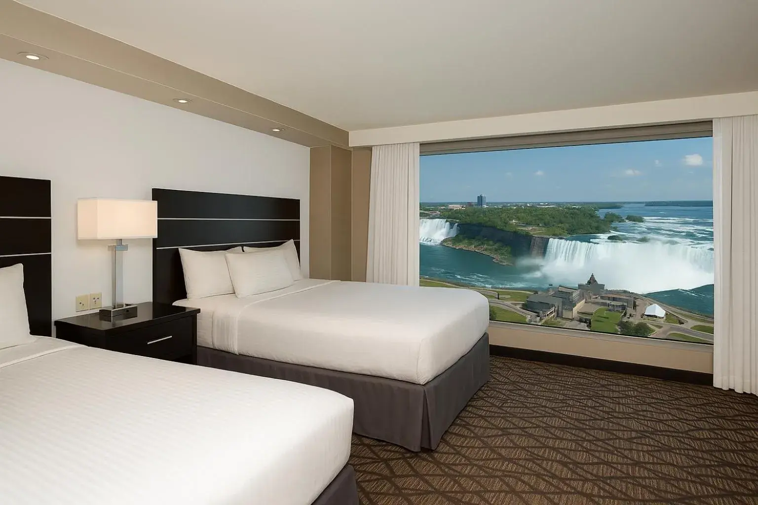 Queen Suite with Three Queen Beds and Horseshoe/US Falls View in Embassy Suites by Hilton Niagara Falls/ Fallsview Queen Suite with Three Queen Beds and Horseshoe/US Falls View in Embassy Suites by Hilton Niagara Falls/ Fallsview