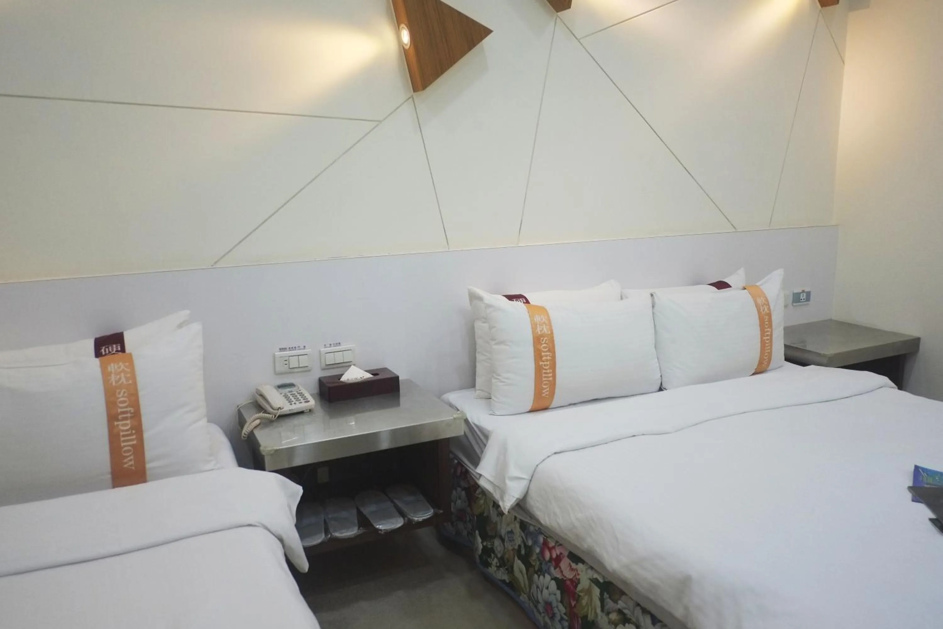 Bed in 柜富賓王旅店-台北館 Giant Rich King Plaza Hotel