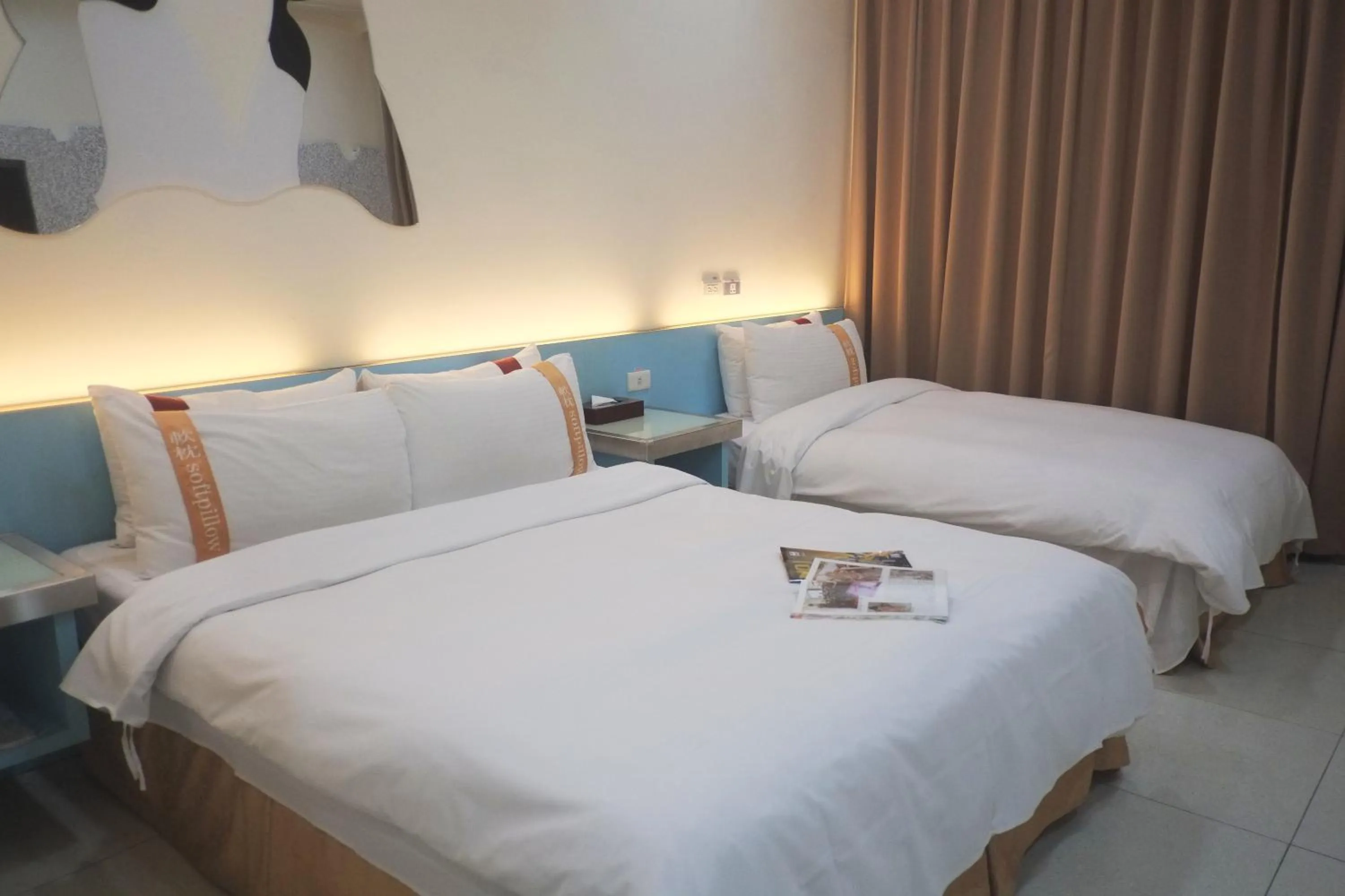 Bed in 柜富賓王旅店-台北館 Giant Rich King Plaza Hotel