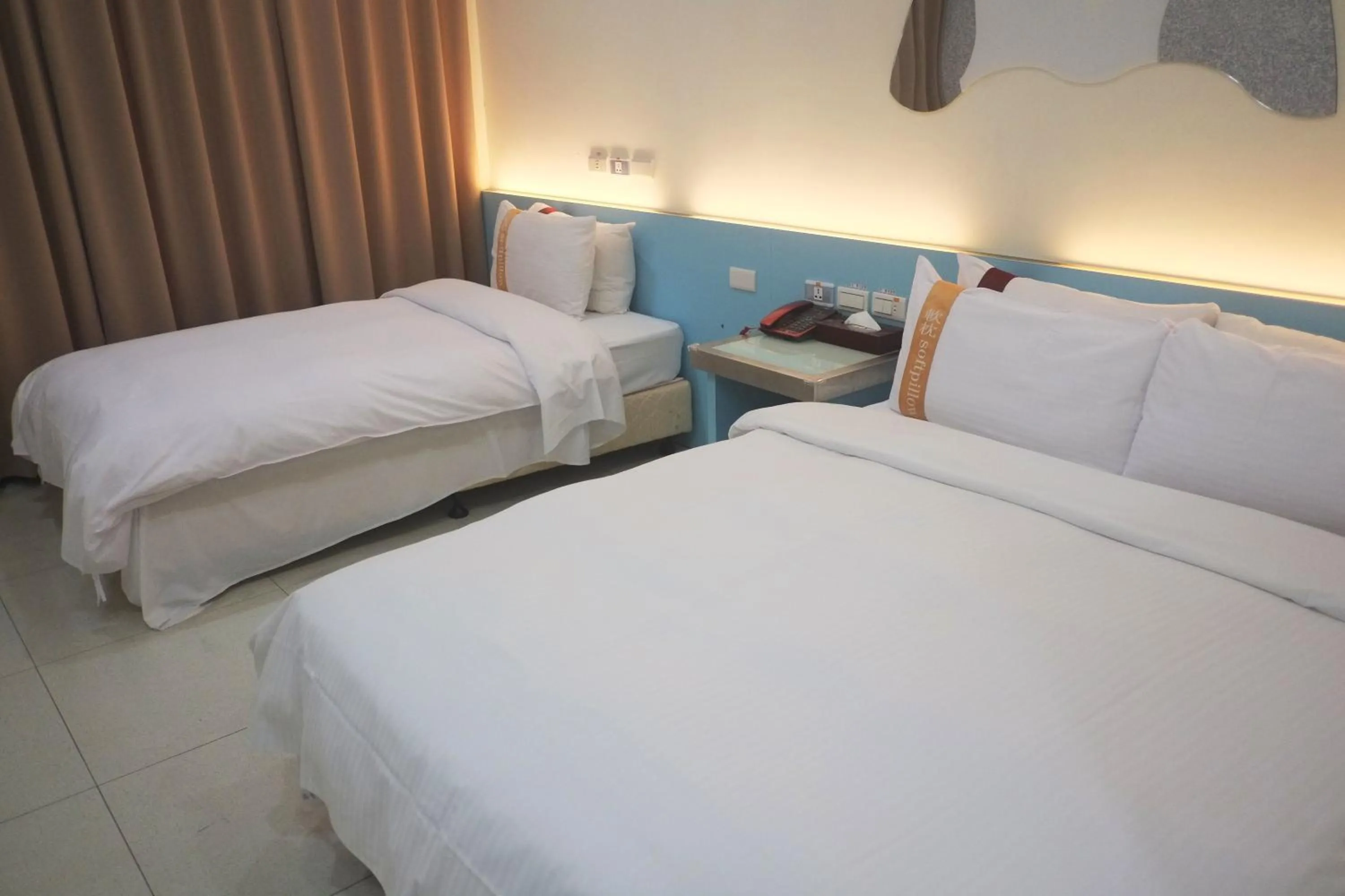 Bed in 柜富賓王旅店-台北館 Giant Rich King Plaza Hotel