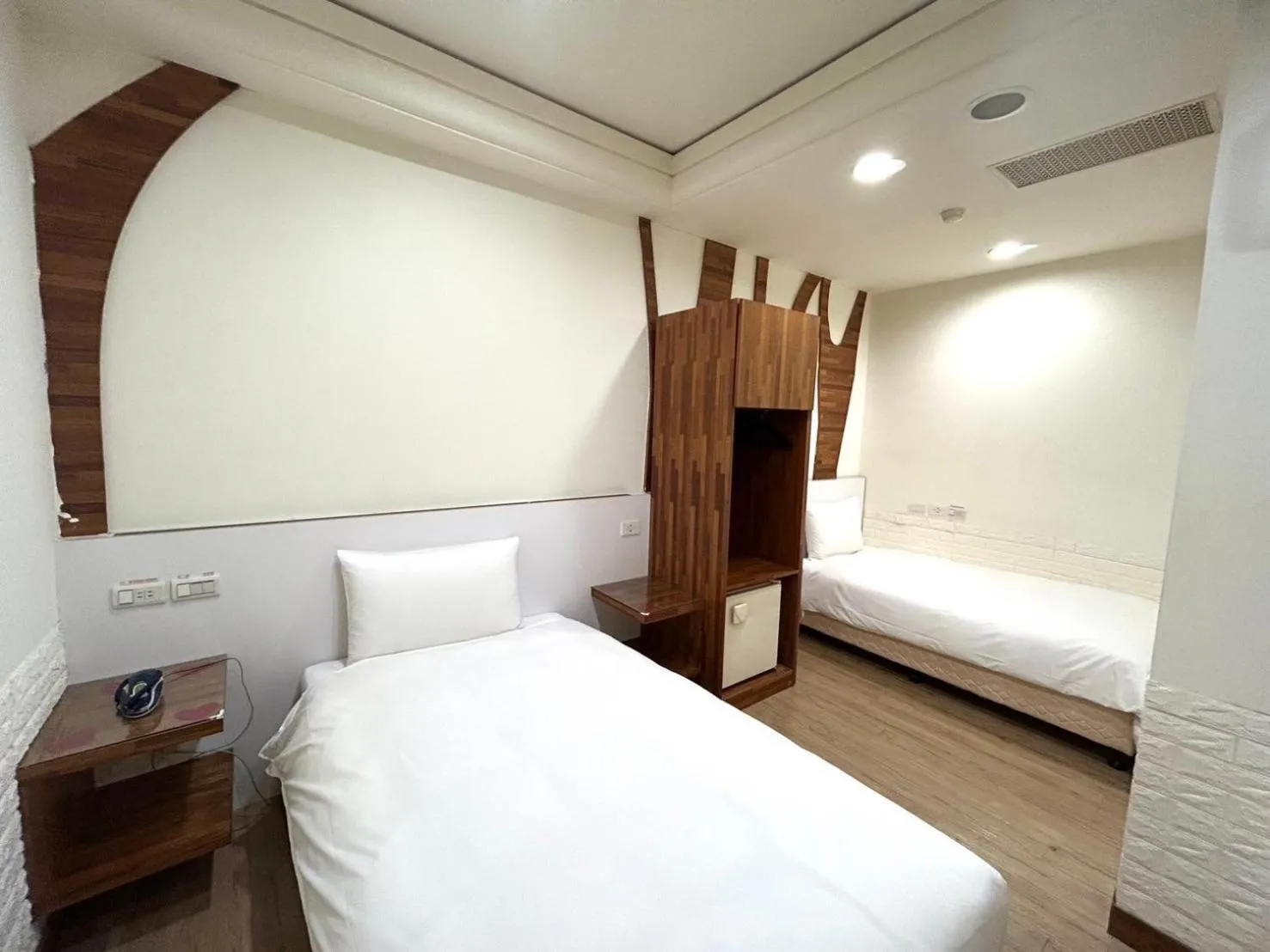 Bed in 柜富賓王旅店-台北館 Giant Rich King Plaza Hotel