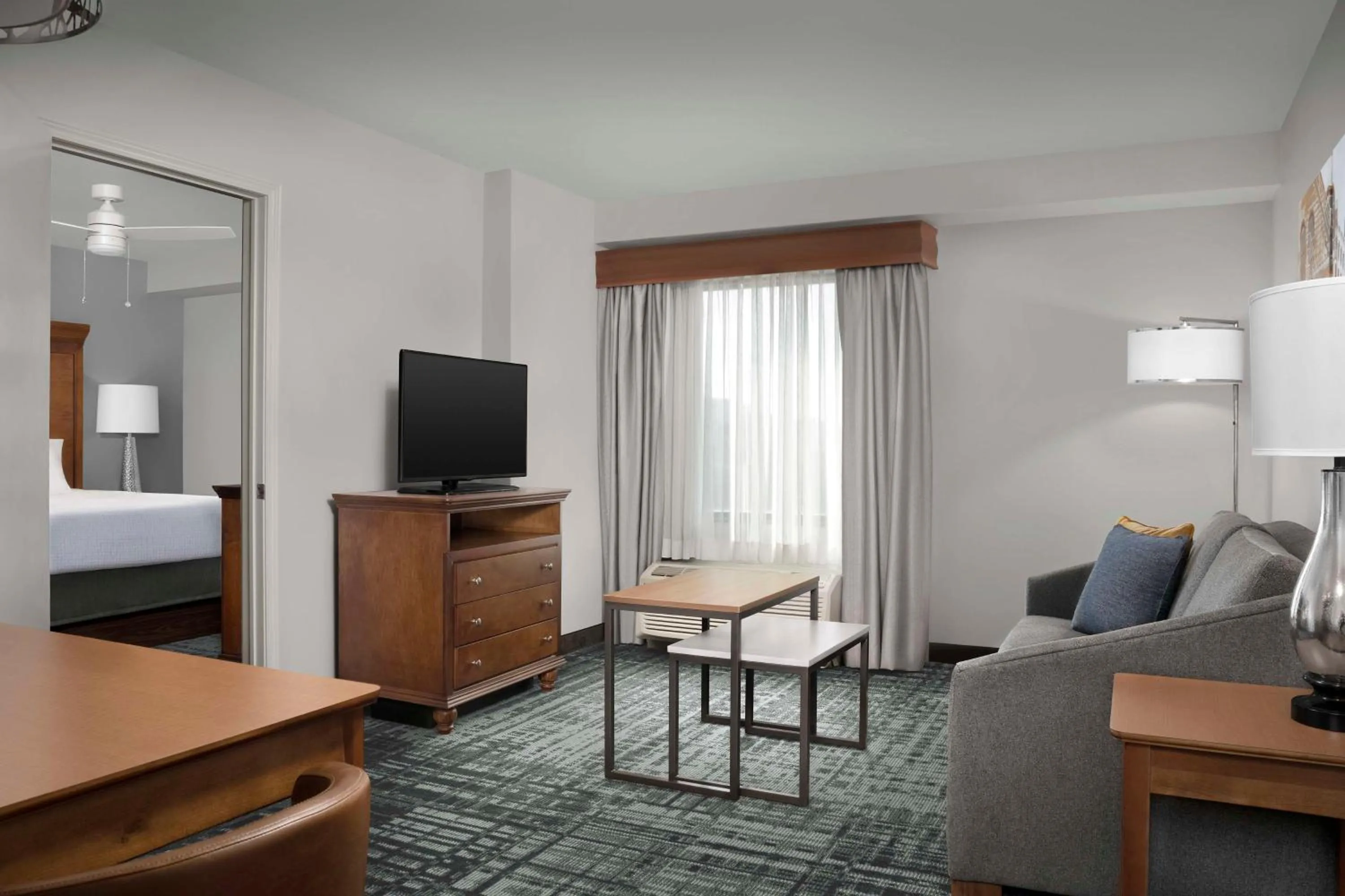 Living room, Bed in Homewood Suites by Hilton Omaha - Downtown