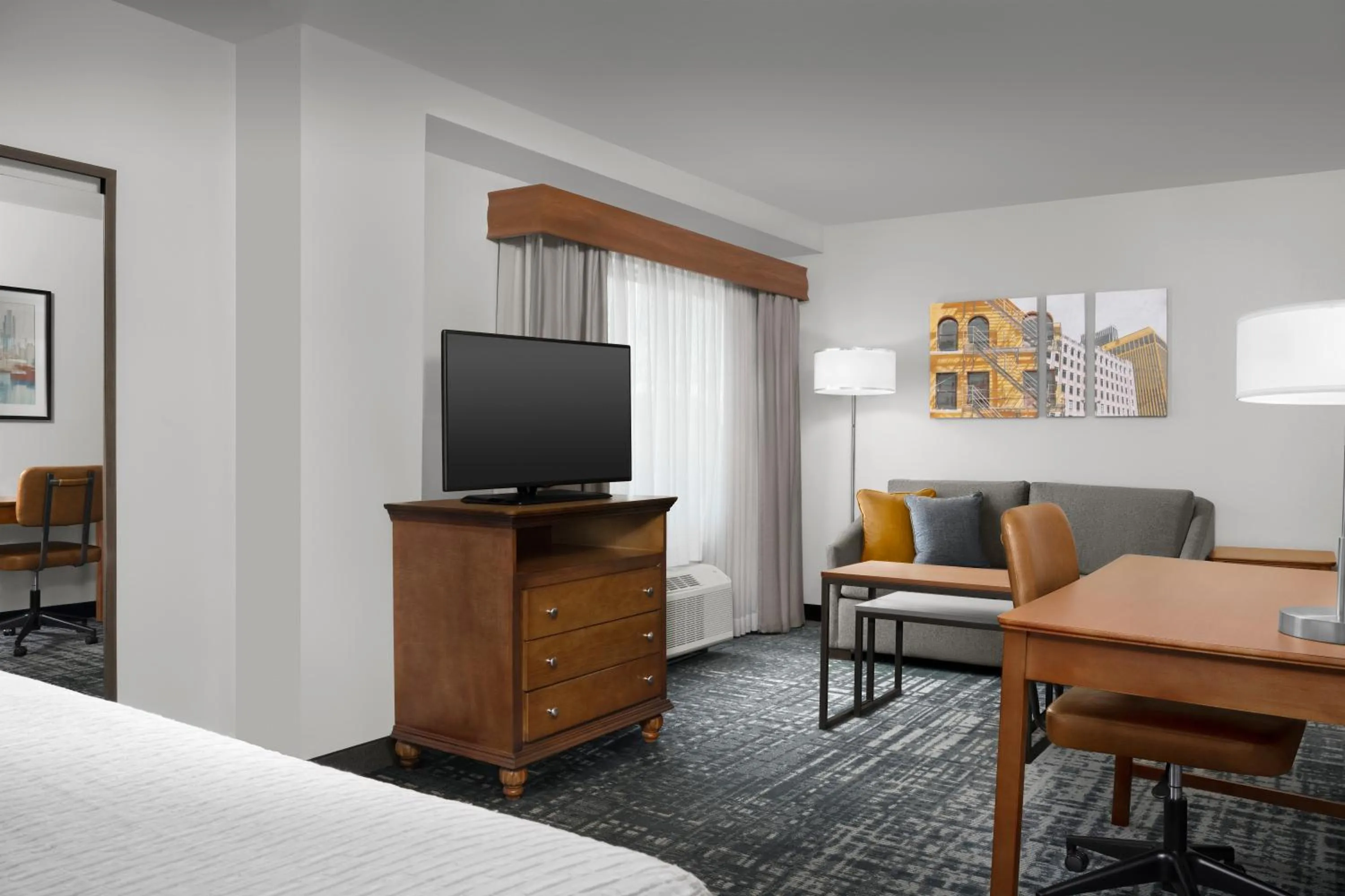 Living room, Bed in Homewood Suites by Hilton Omaha - Downtown