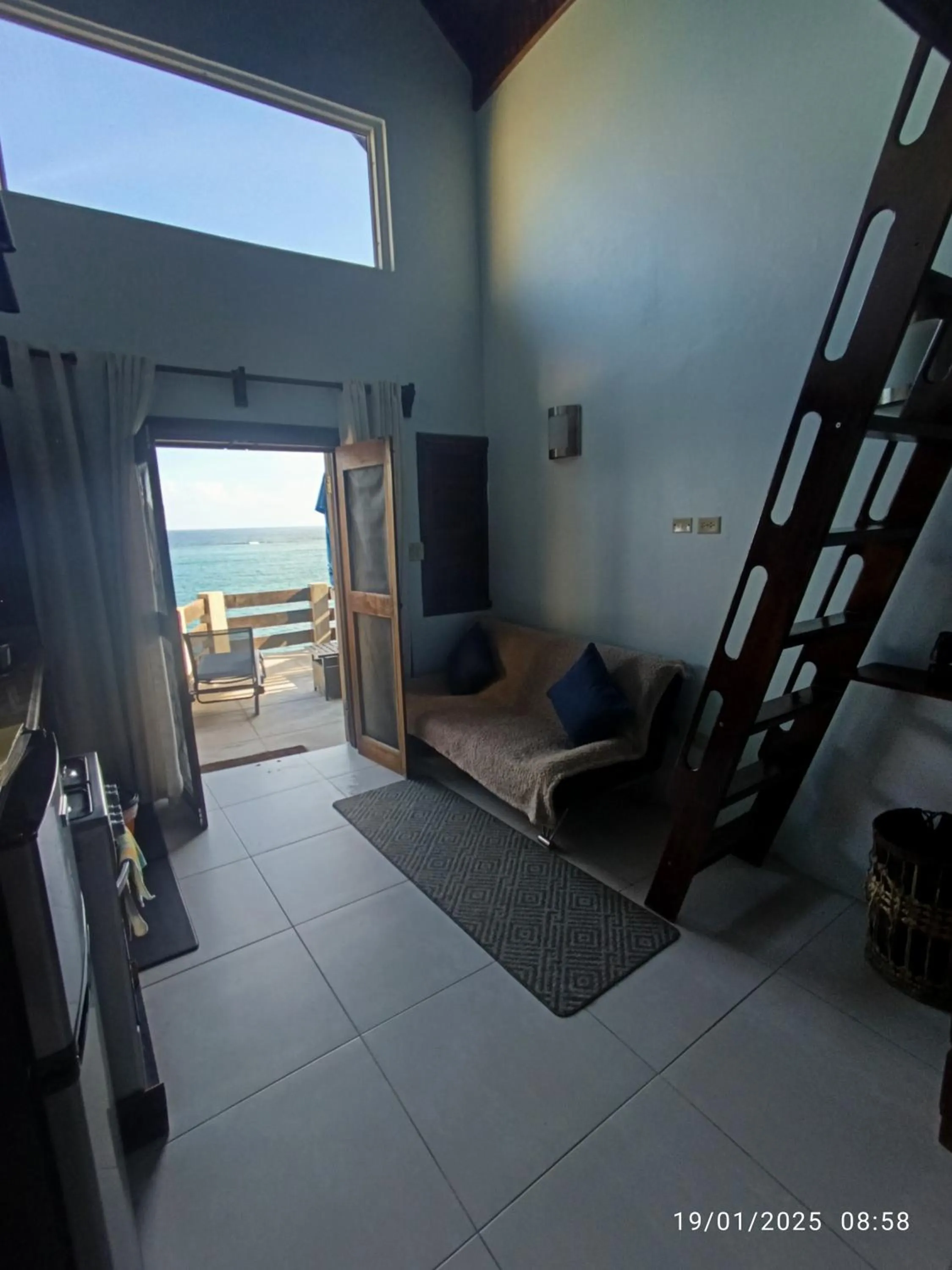 Seating area in Shipwatcher Studio w/Mezzanine