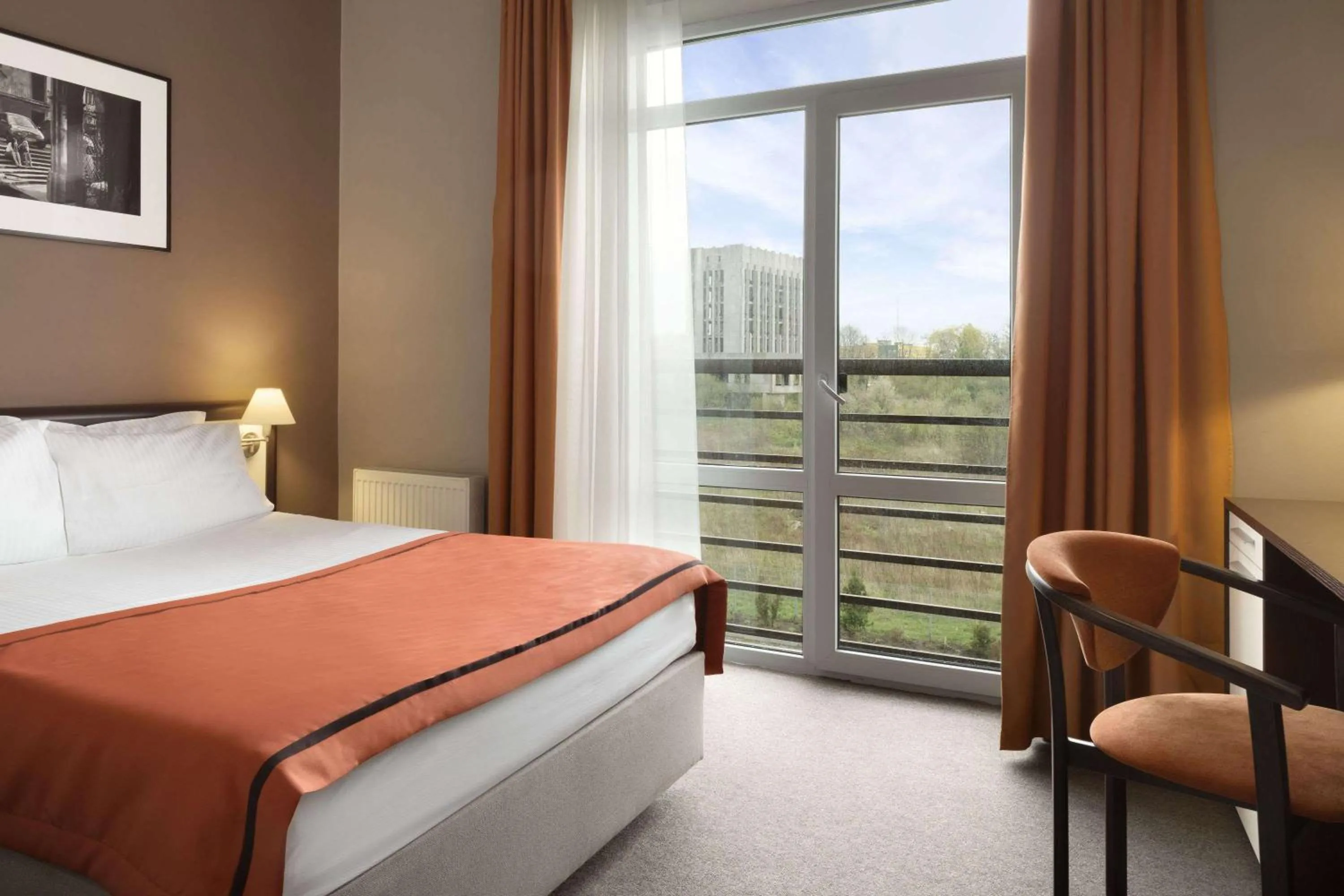 Photo of the whole room, Bed in Lviv Ramada Hotel