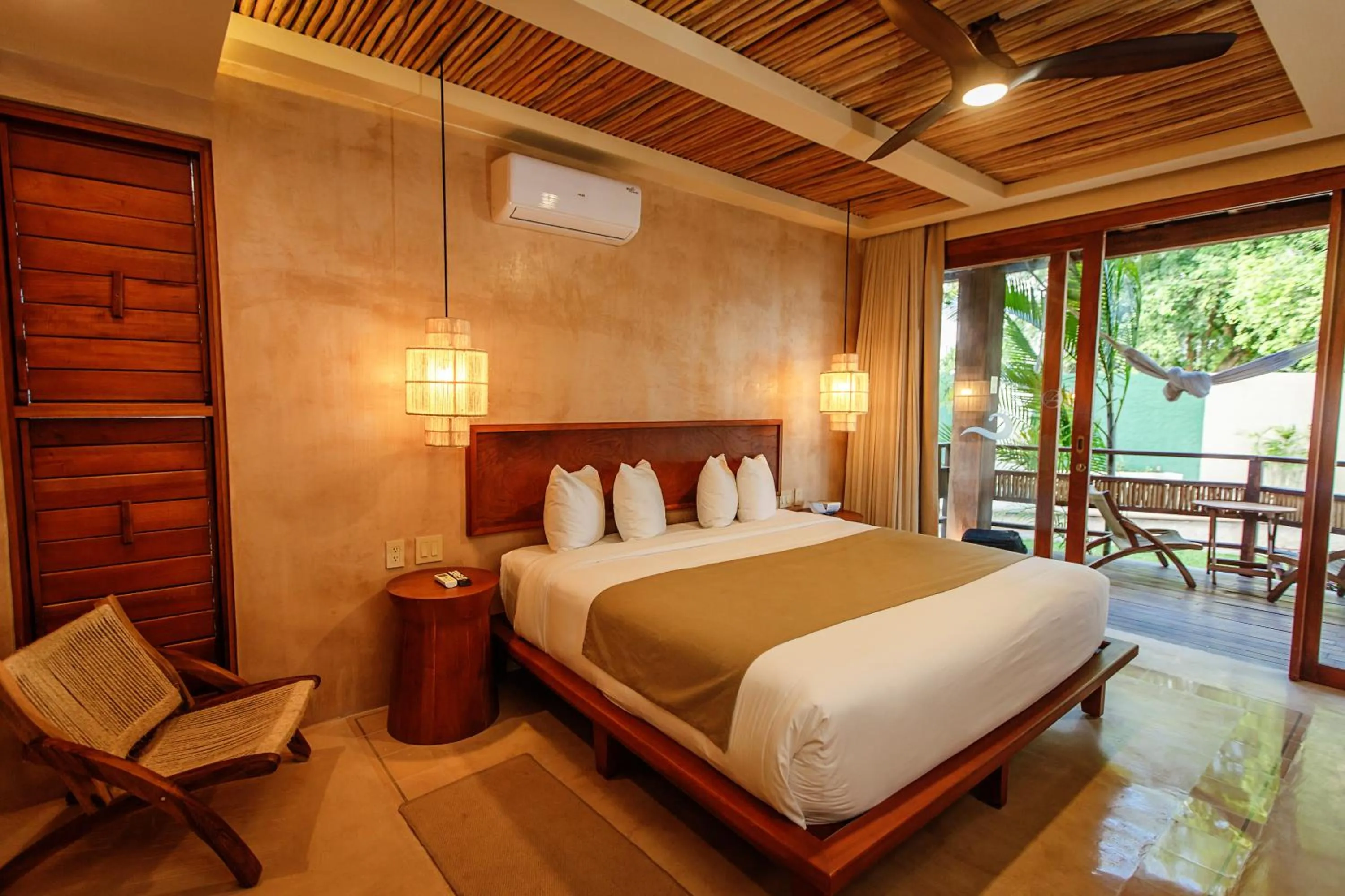 Bed in Hotel Carolina Bacalar