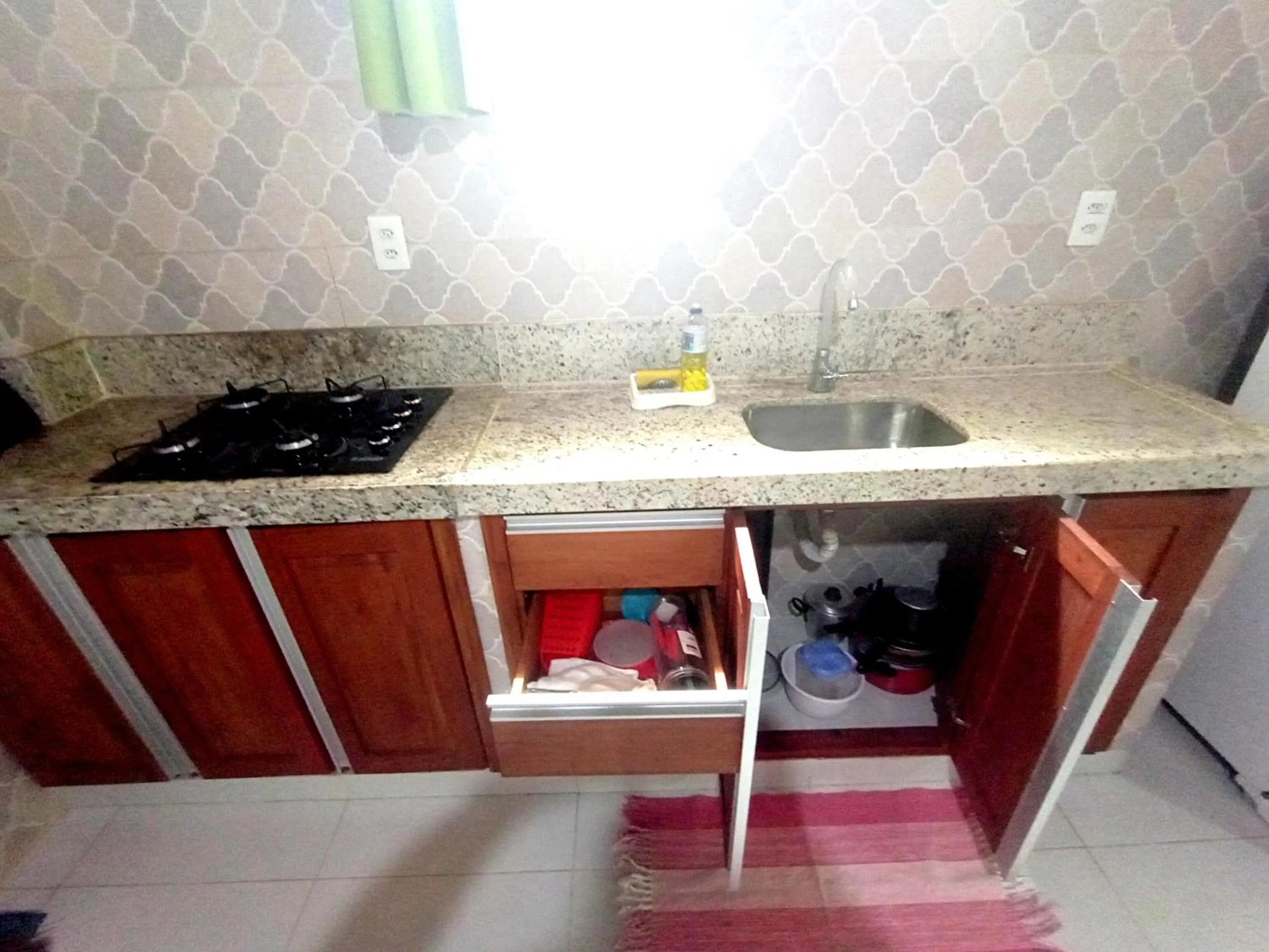 Kitchen or kitchenette in Pousada Lagoa Flat