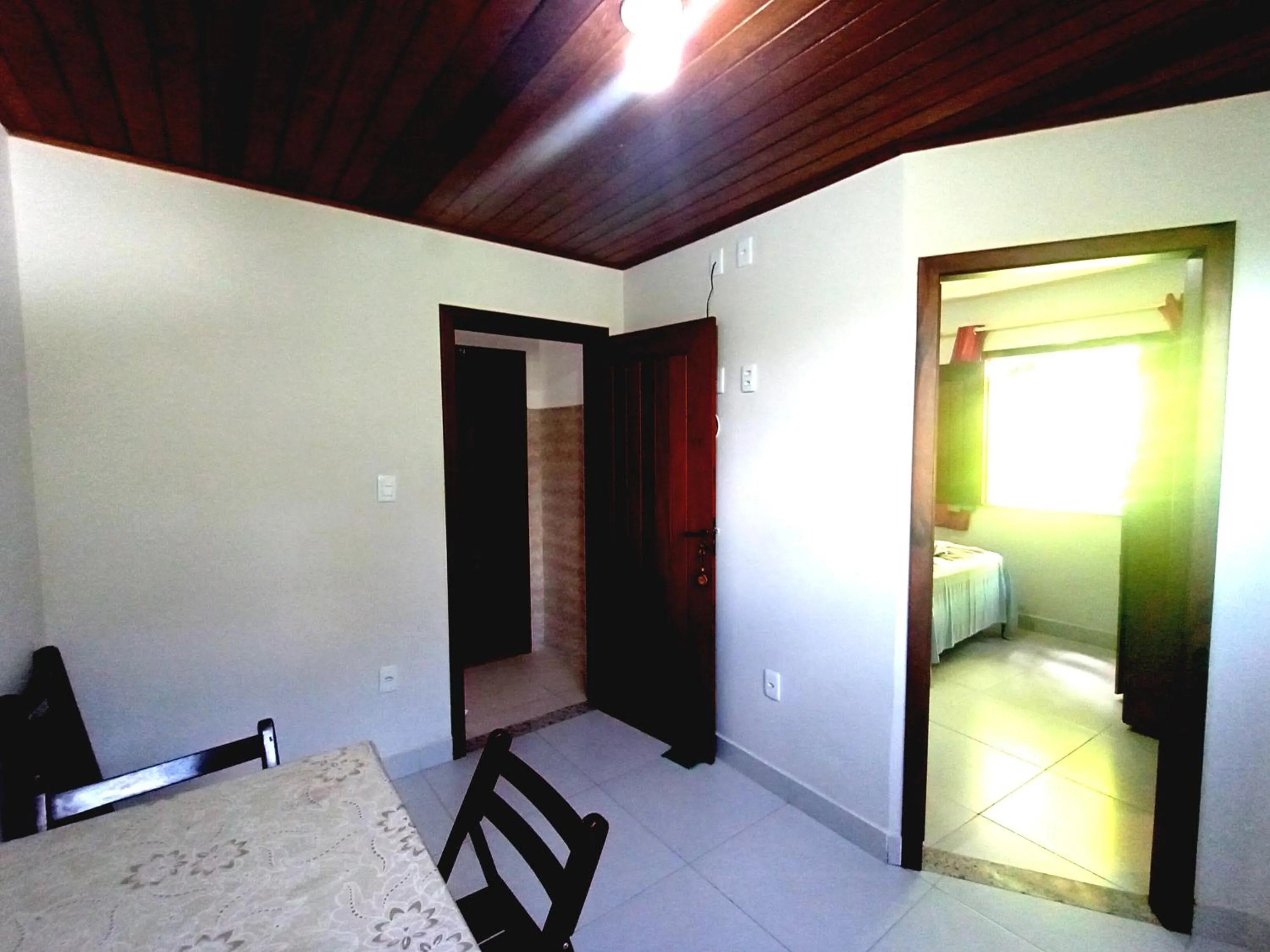 Kitchen or kitchenette, Bed in Pousada Lagoa Flat