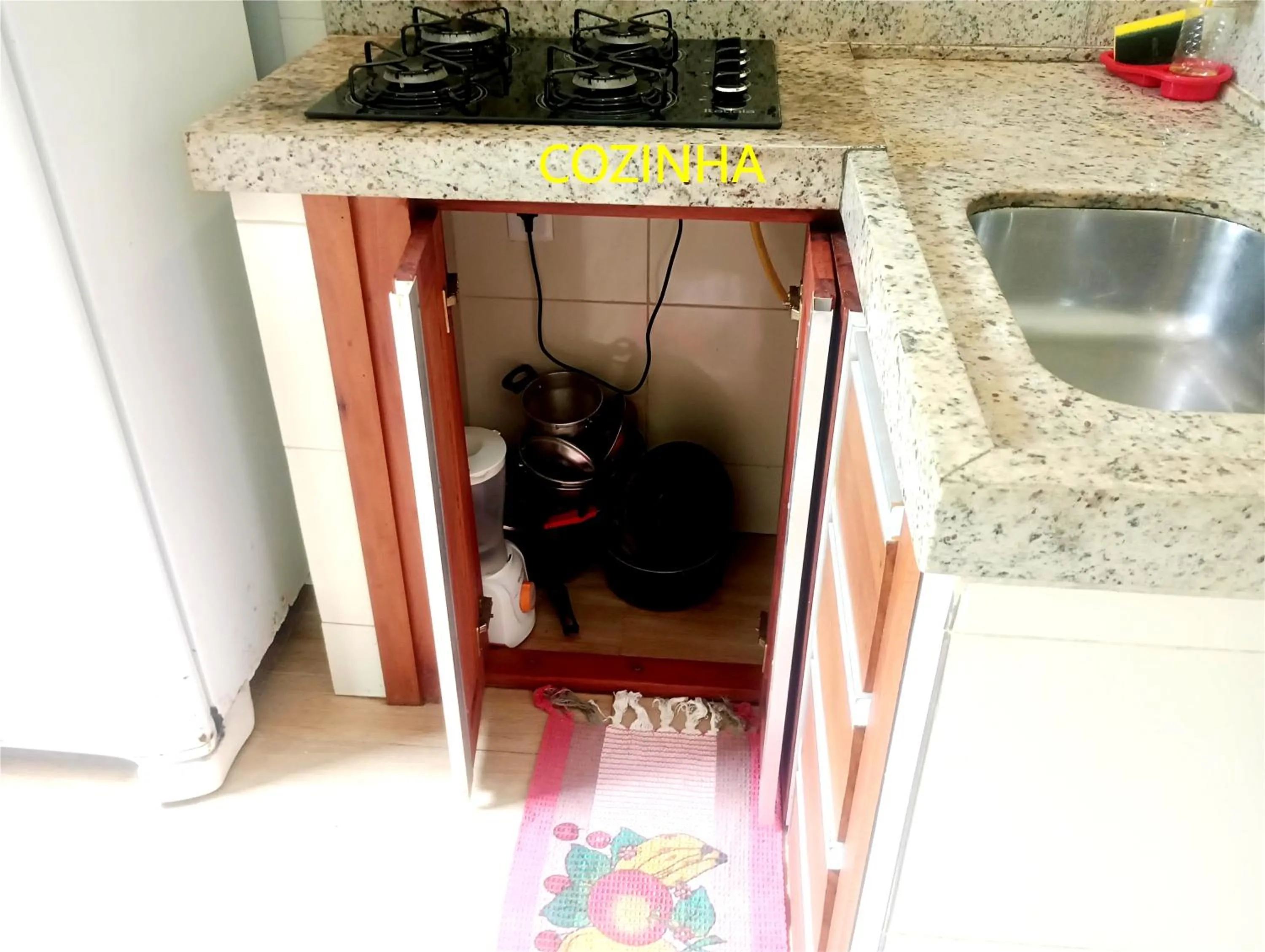 Kitchen or kitchenette in Pousada Lagoa Flat