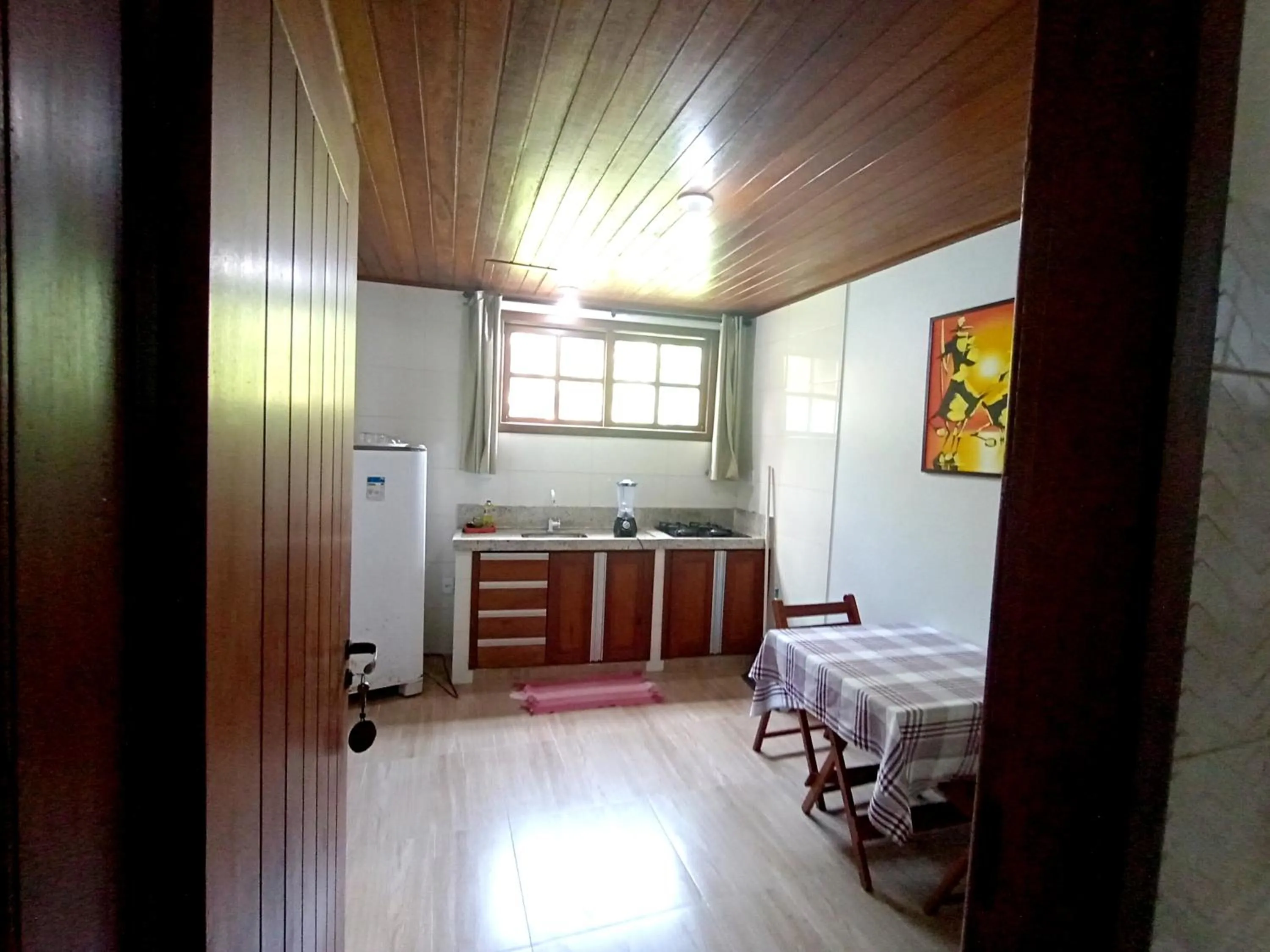 Kitchen or kitchenette in Pousada Lagoa Flat