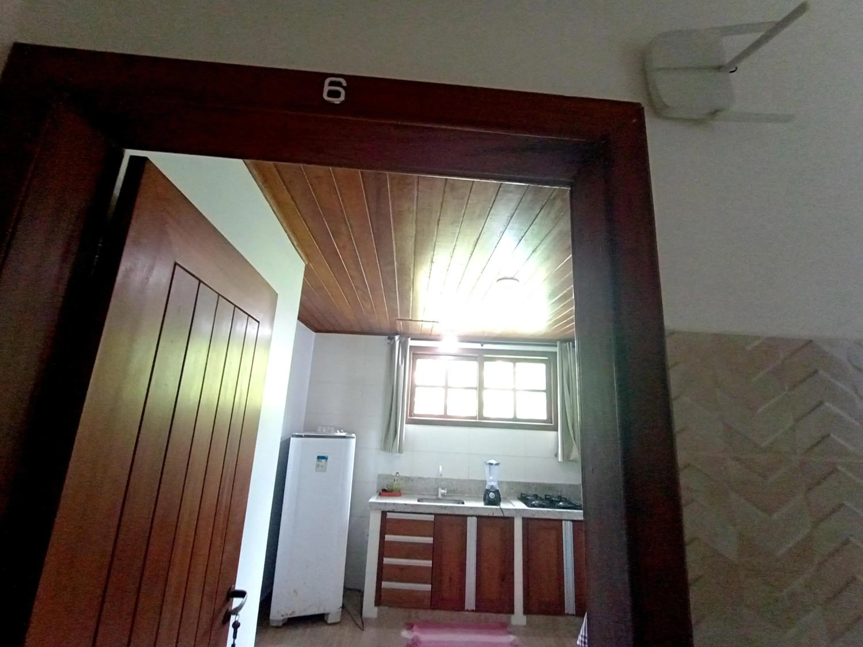 Kitchen or kitchenette in Pousada Lagoa Flat