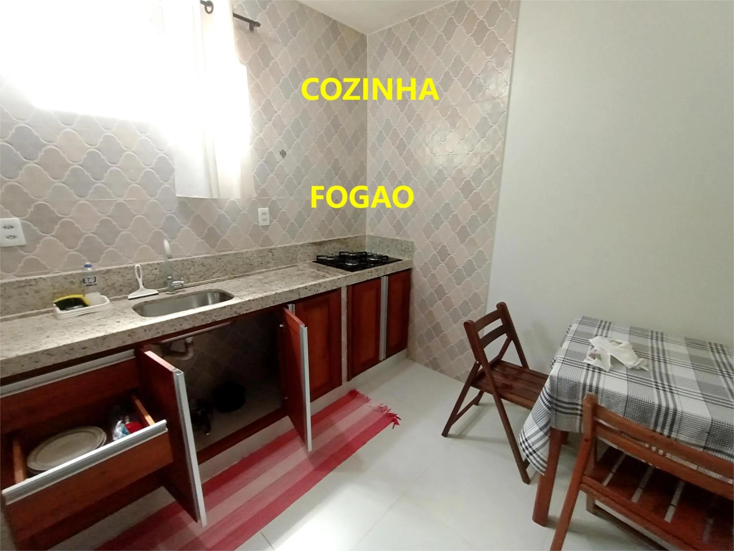 Kitchen or kitchenette in Pousada Lagoa Flat