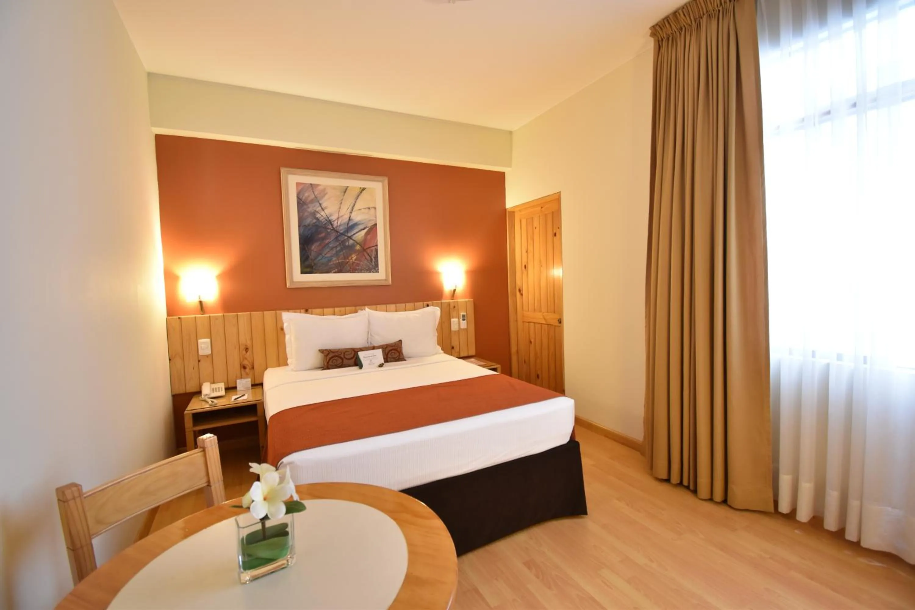 Bed in Qorianka Hotel