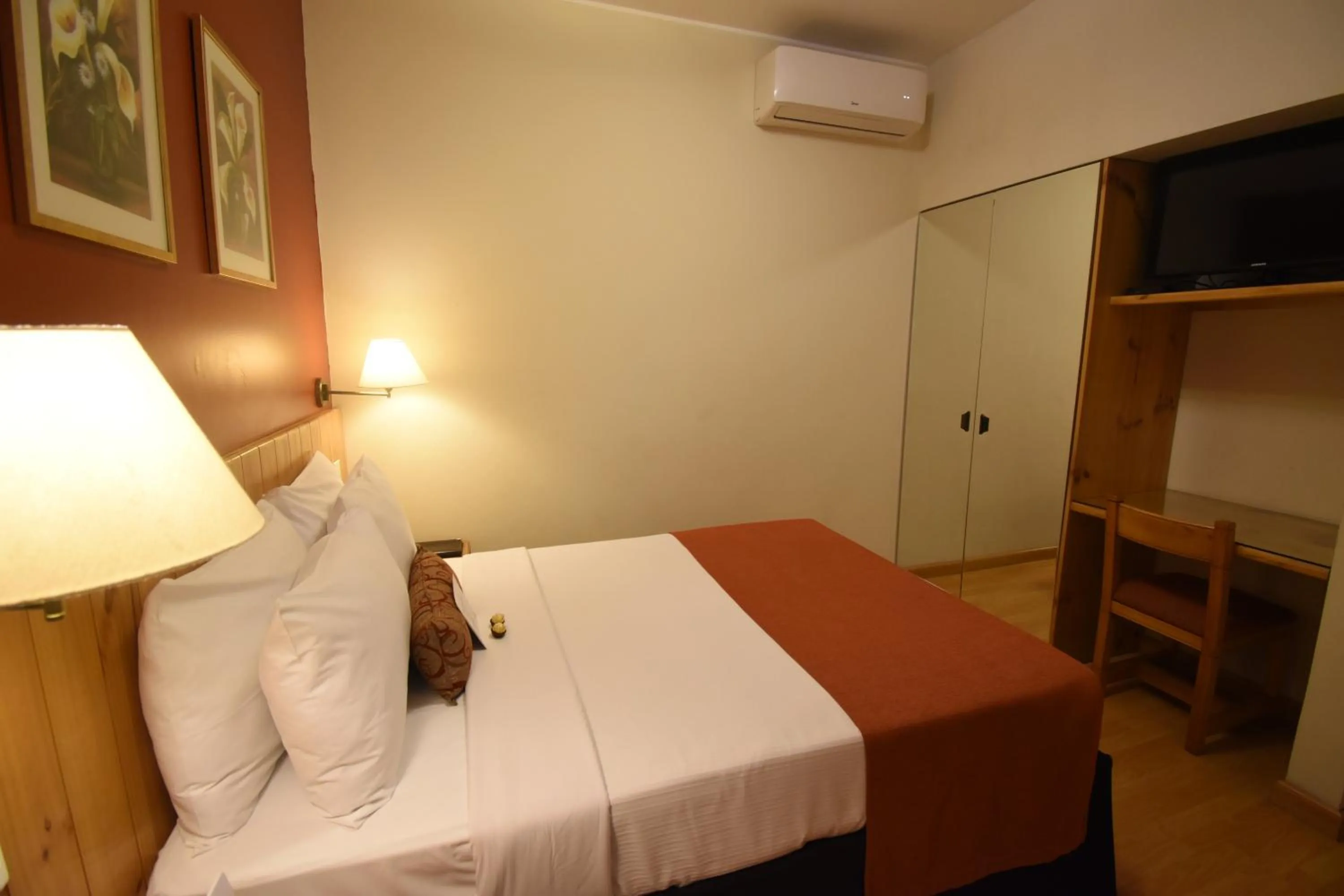 Bed in Qorianka Hotel