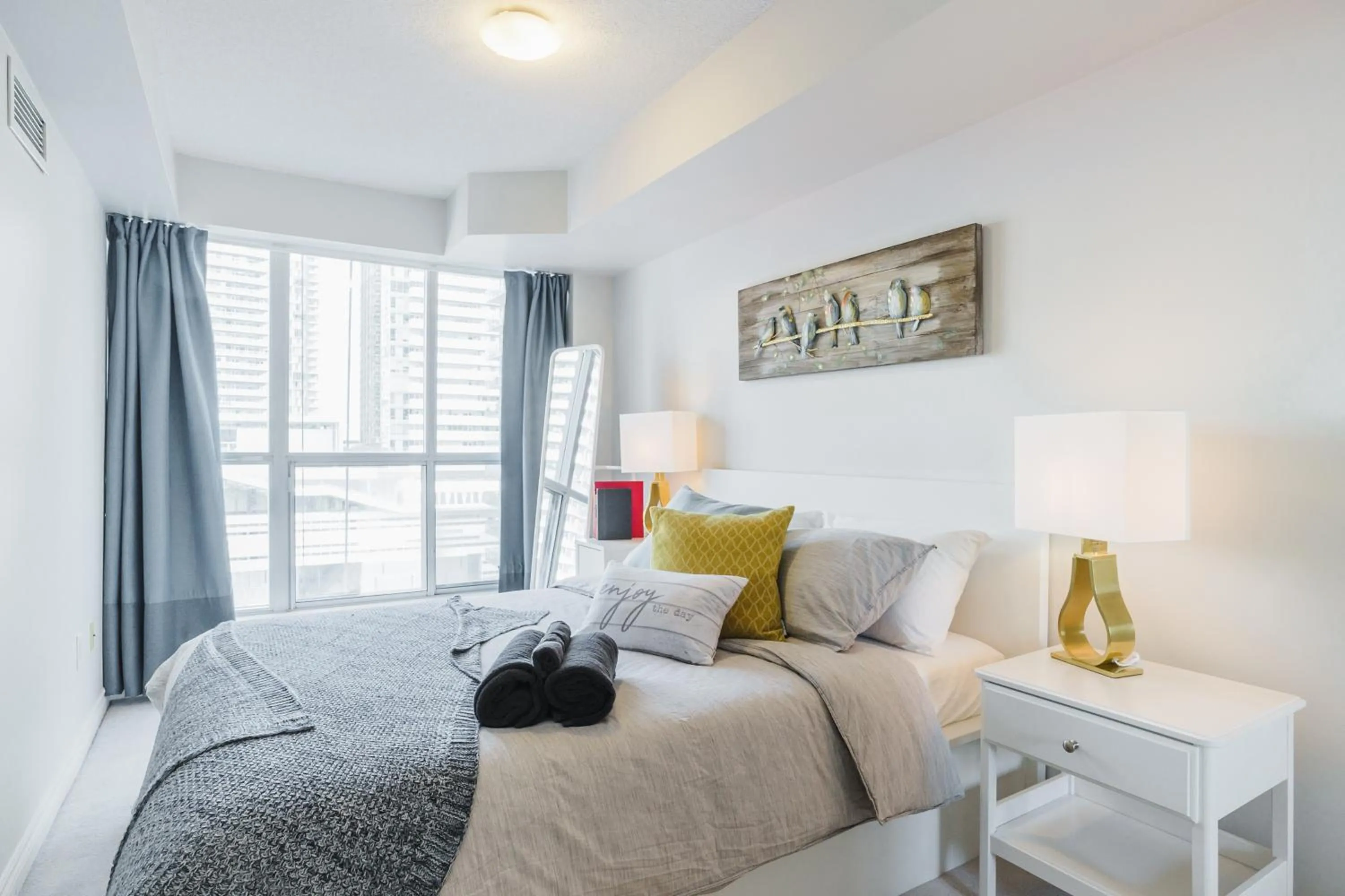 Bed in AOC Suites - Heart of Downtown Condo