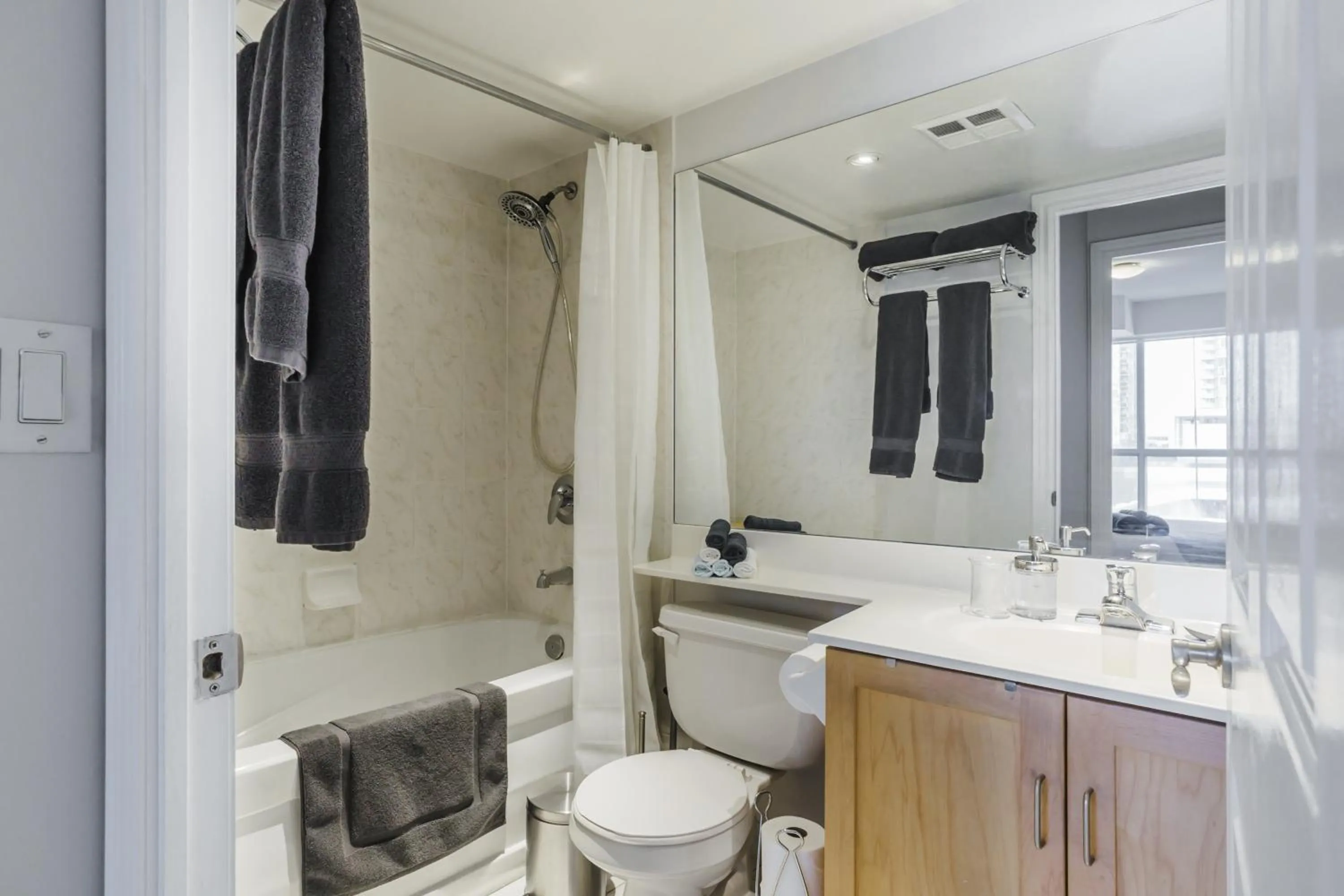 Shower in AOC Suites - Heart of Downtown Condo