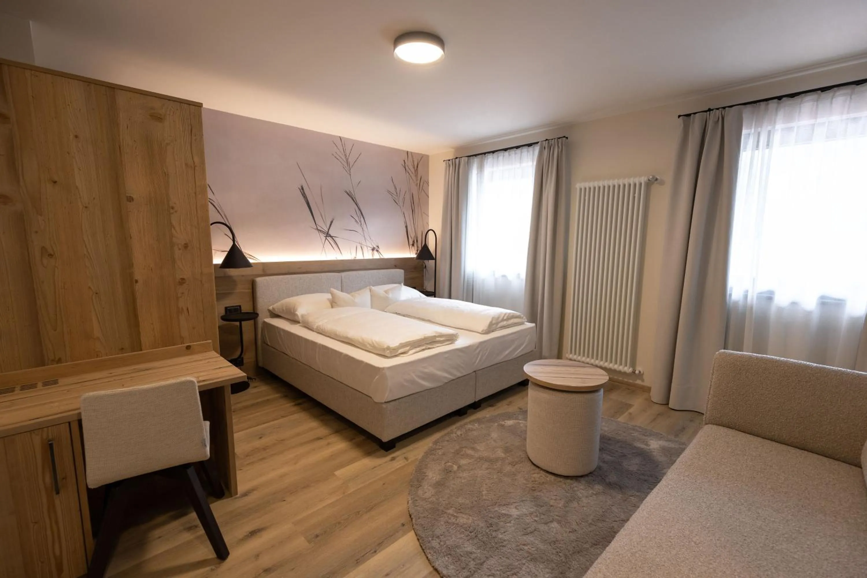 Bed in Hotel Alpenrose Wellness