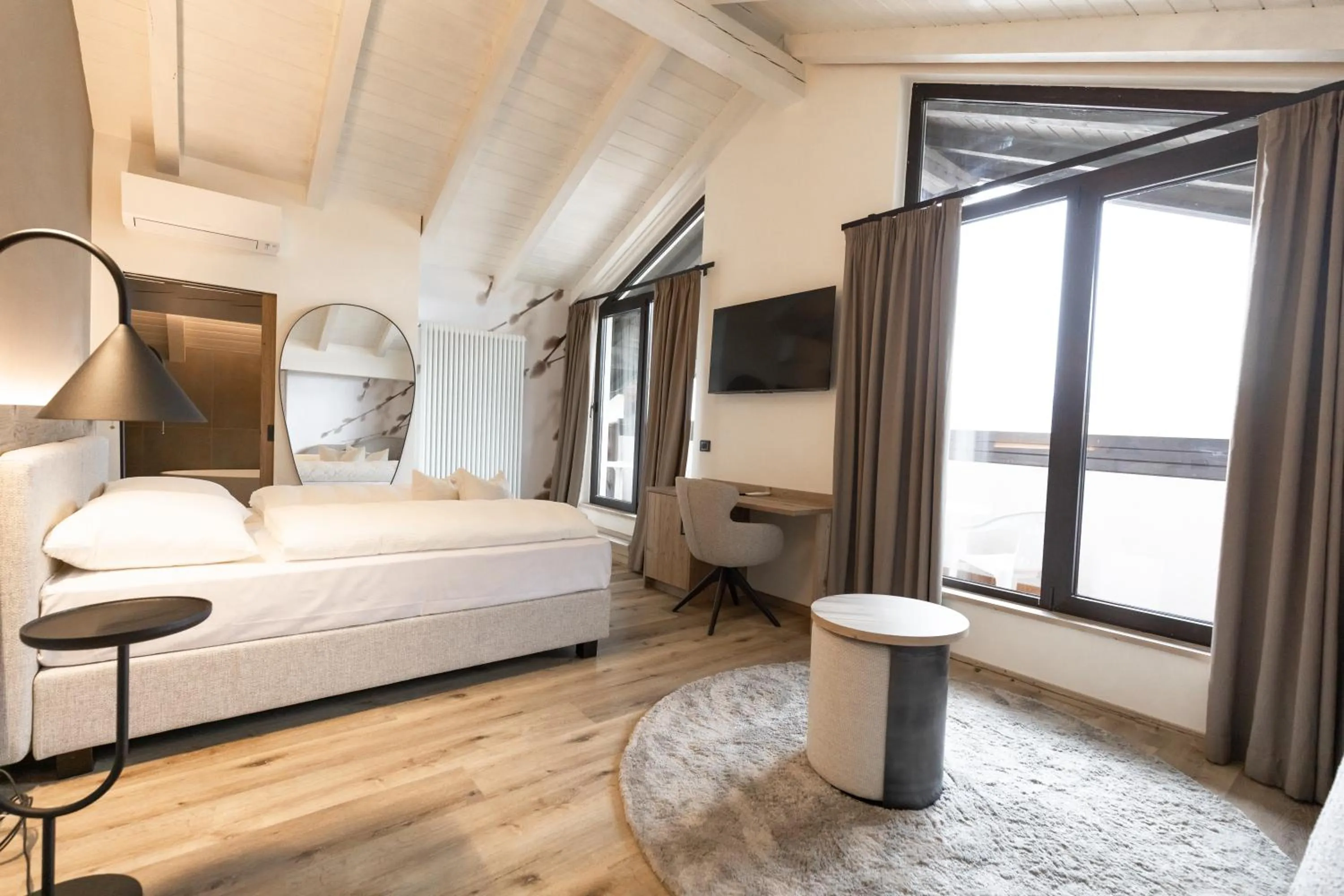 Bed in Hotel Alpenrose Wellness