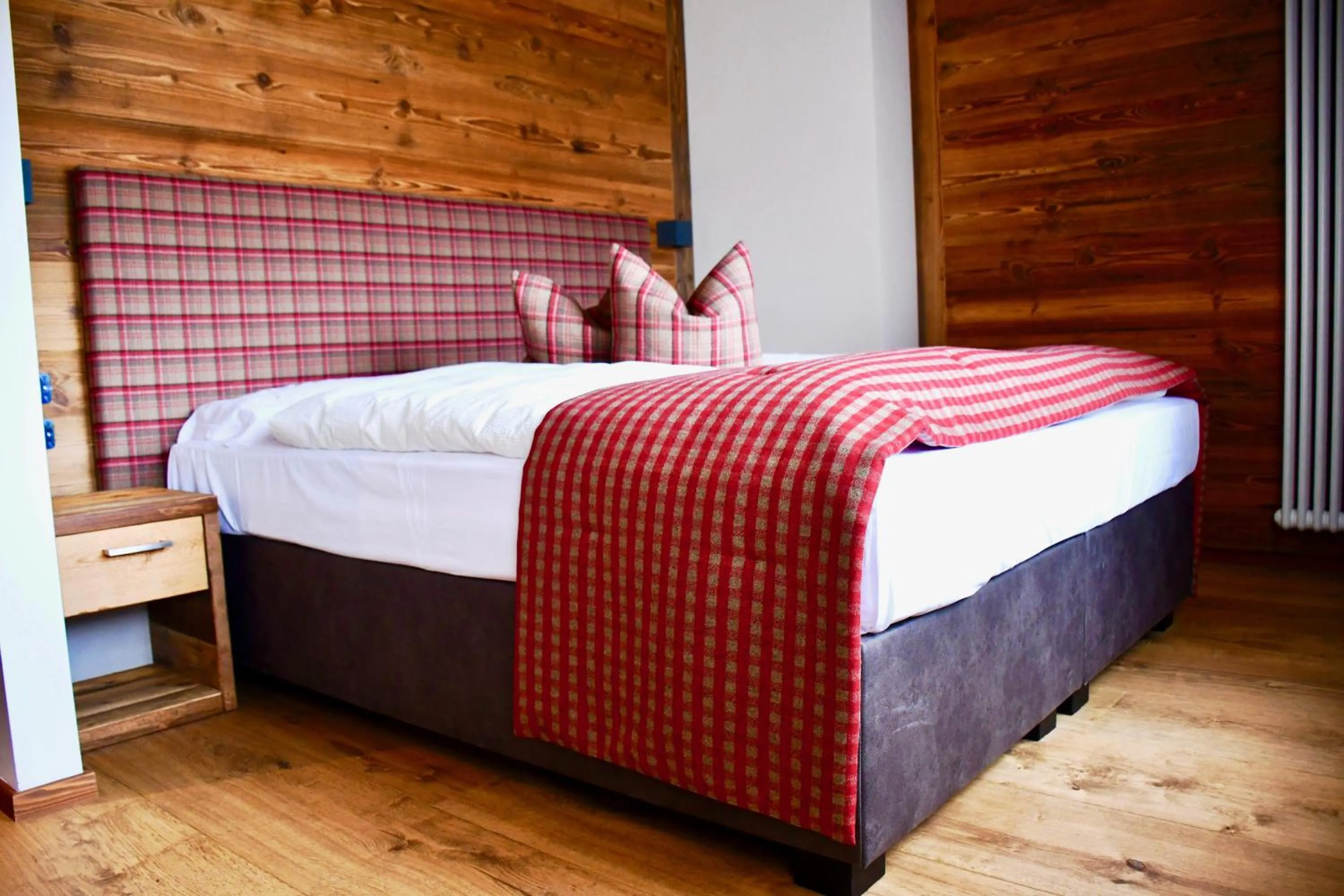 Bed in Hotel Alpenrose Wellness
