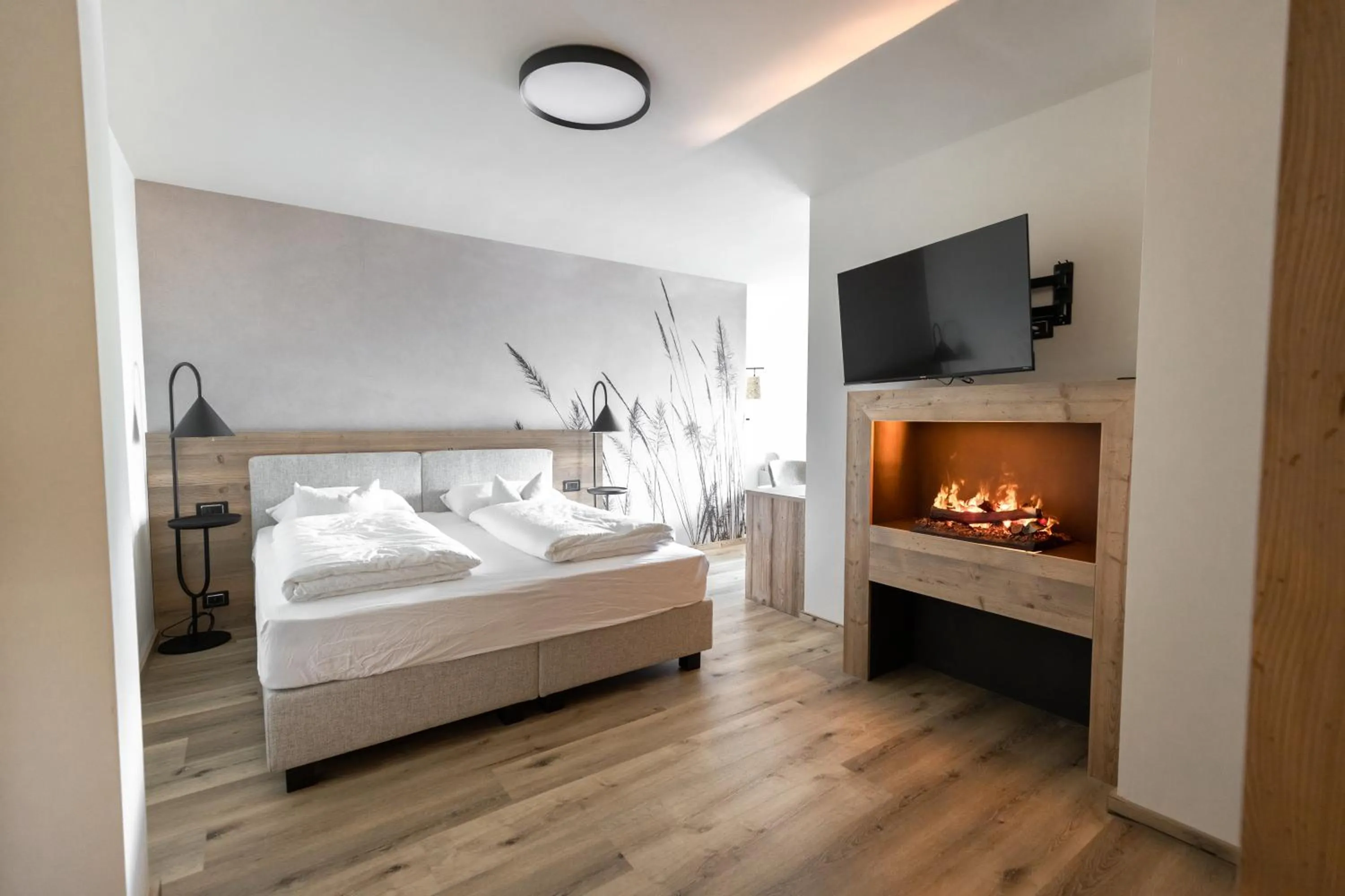 Bed in Hotel Alpenrose Wellness