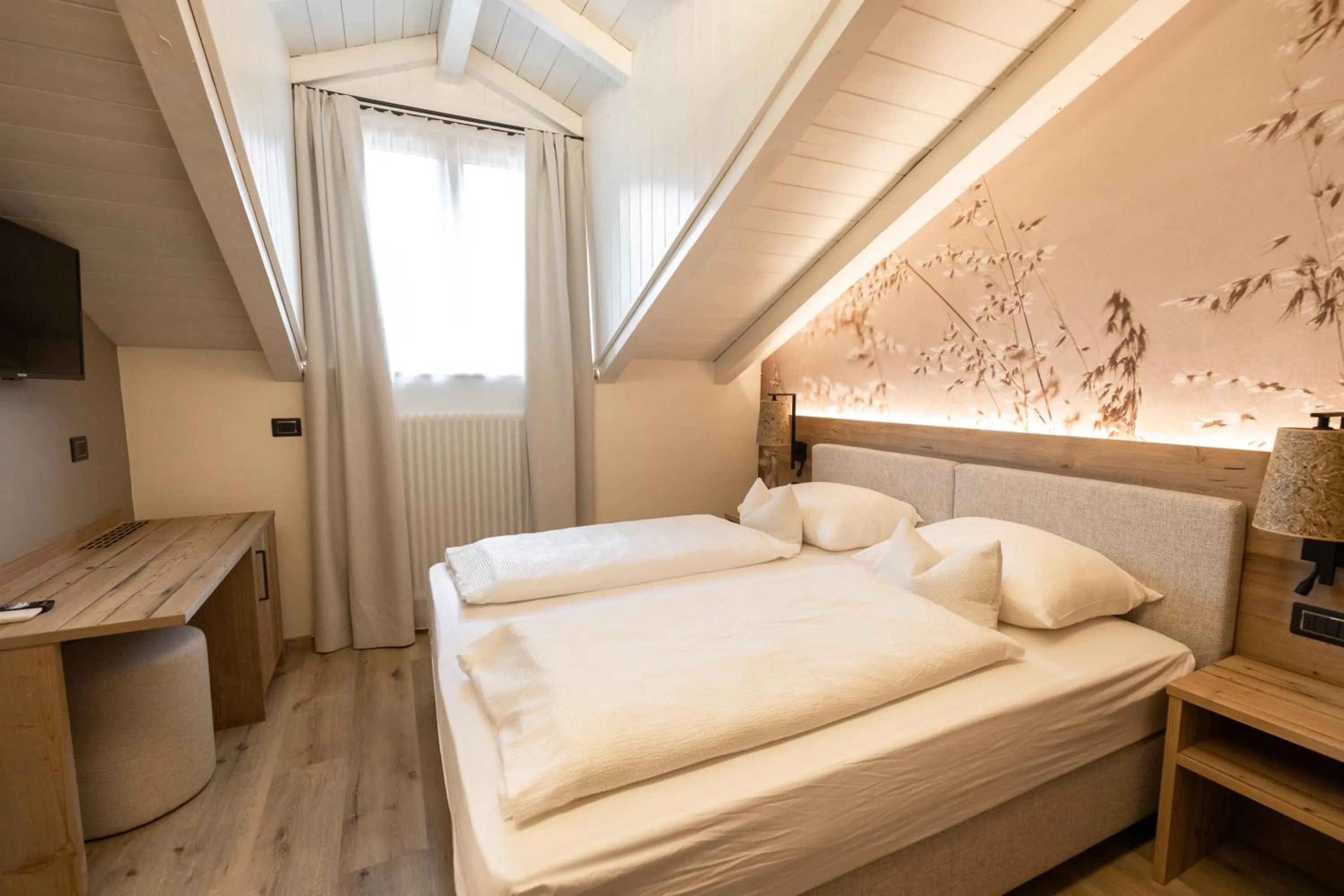 Bed in Hotel Alpenrose Wellness