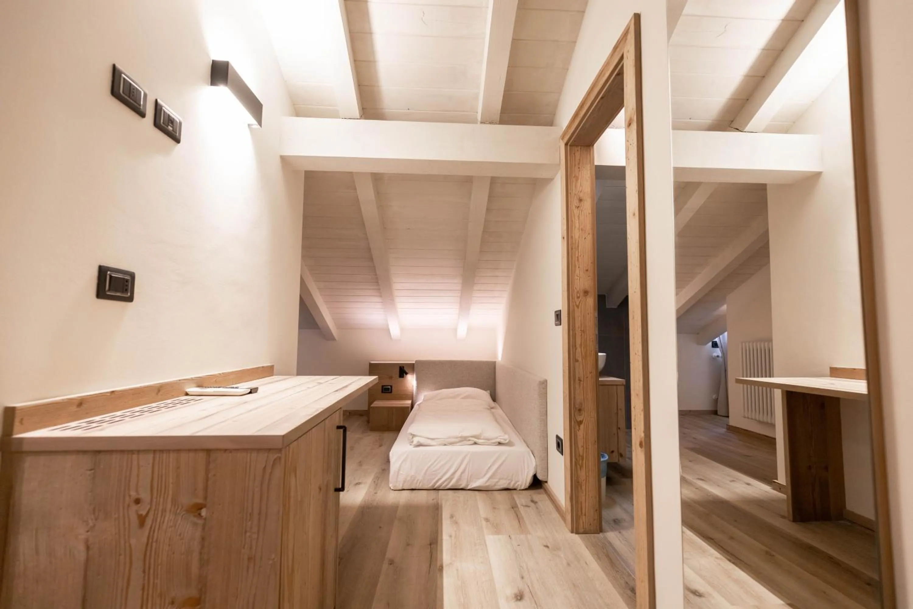 Bed in Hotel Alpenrose Wellness