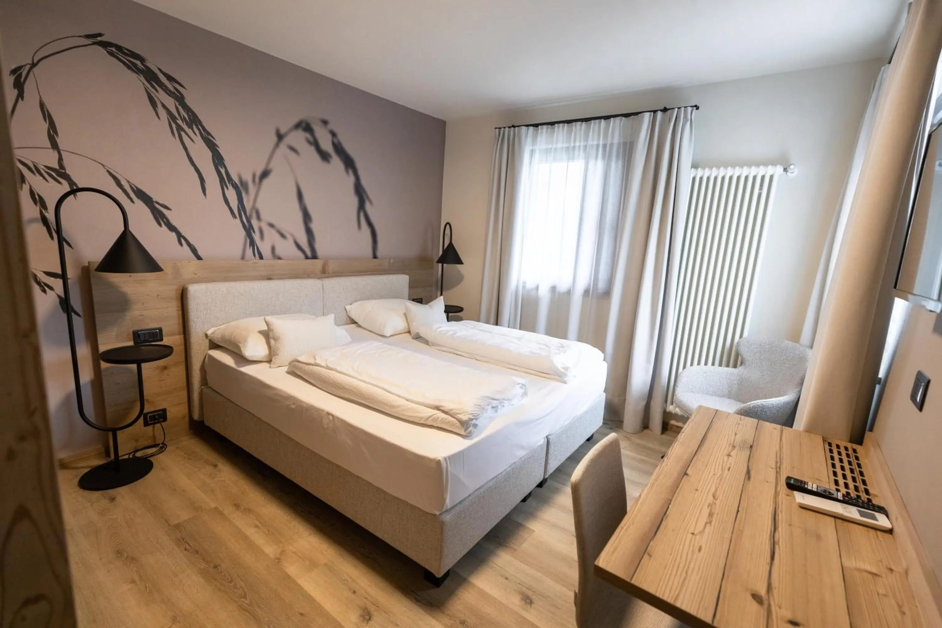 Bed in Hotel Alpenrose Wellness