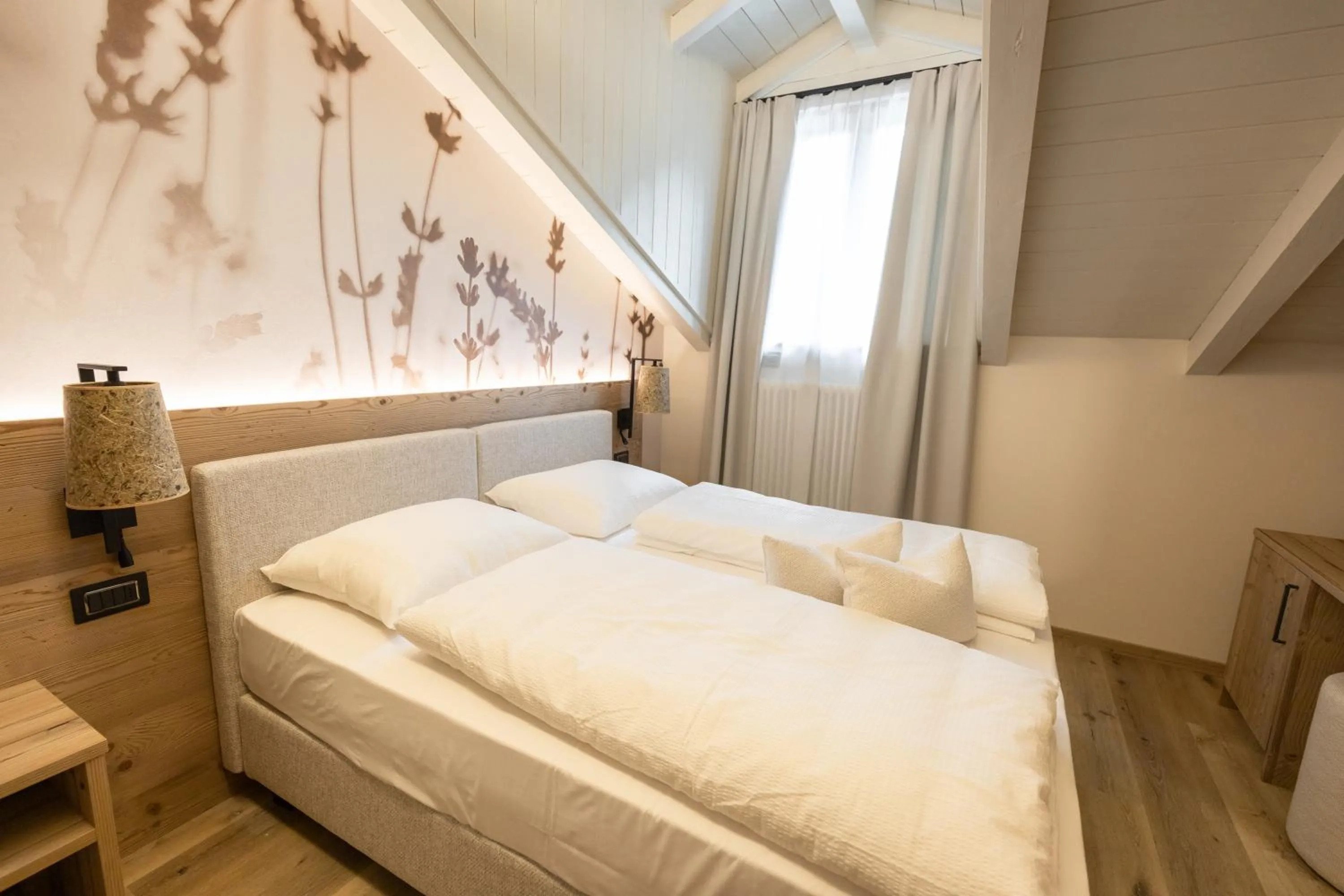 Bed in Hotel Alpenrose Wellness
