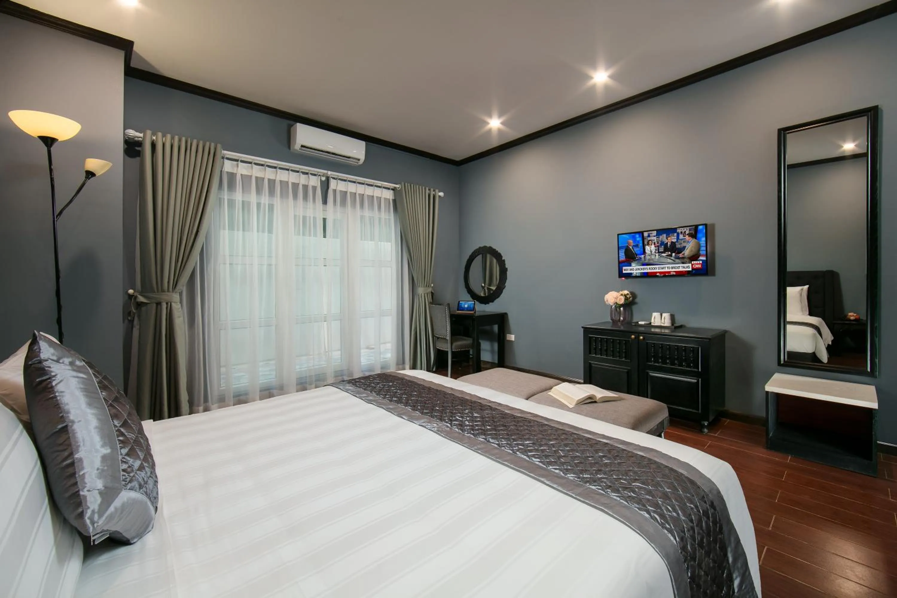 Photo of the whole room, Bed in Vientiane Boutique Hotel