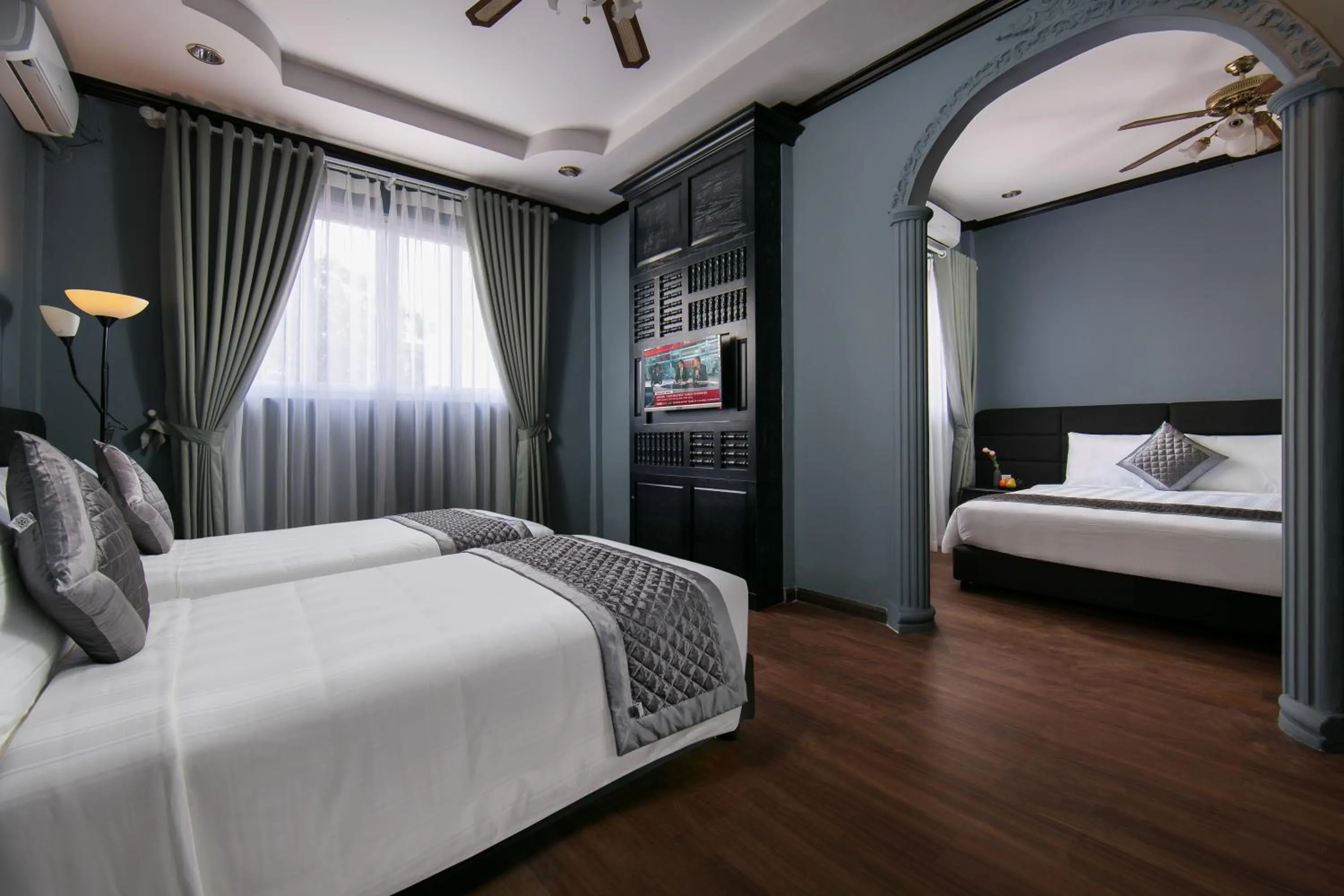 Photo of the whole room, Bed in Vientiane Boutique Hotel