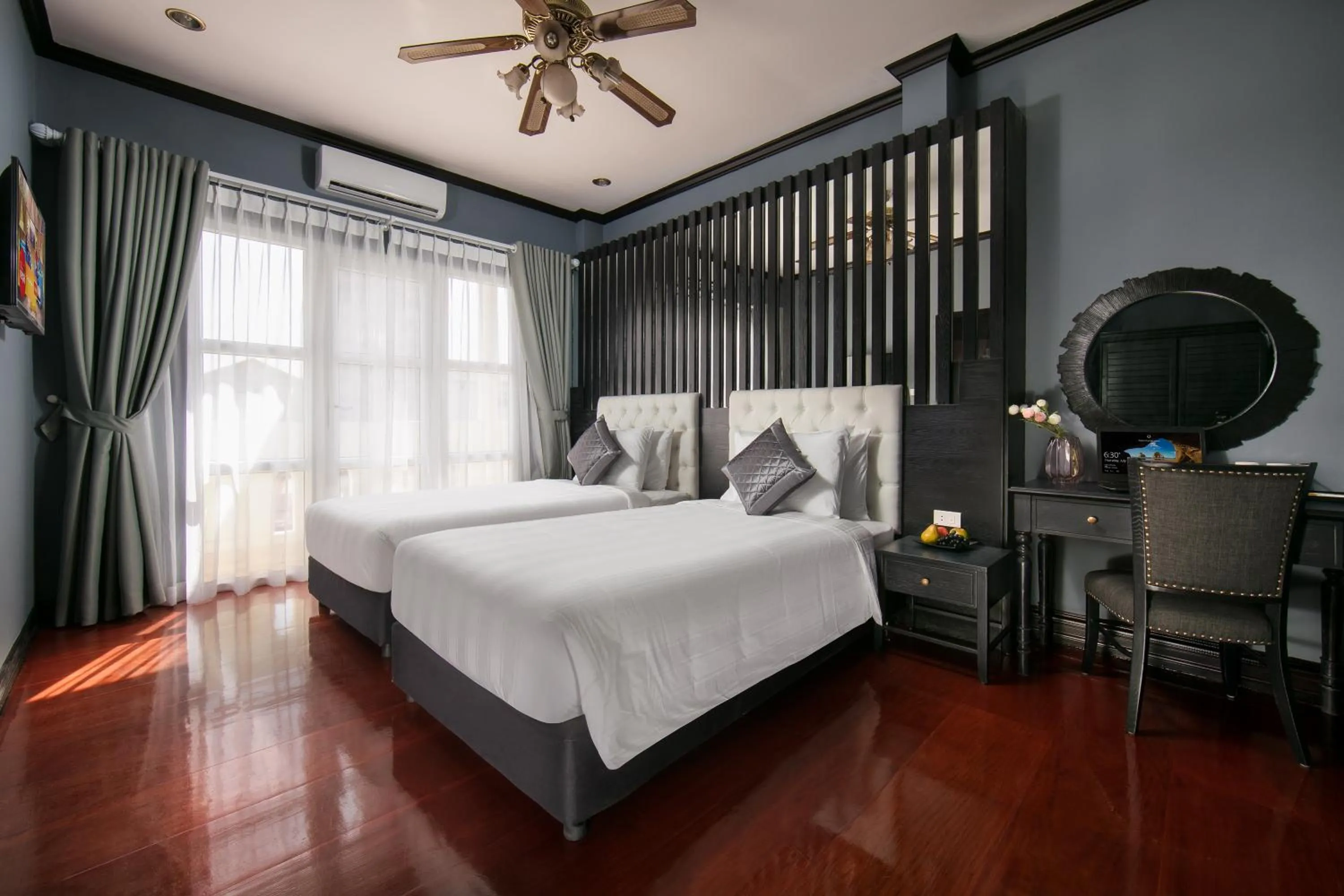 Photo of the whole room, Bed in Vientiane Boutique Hotel