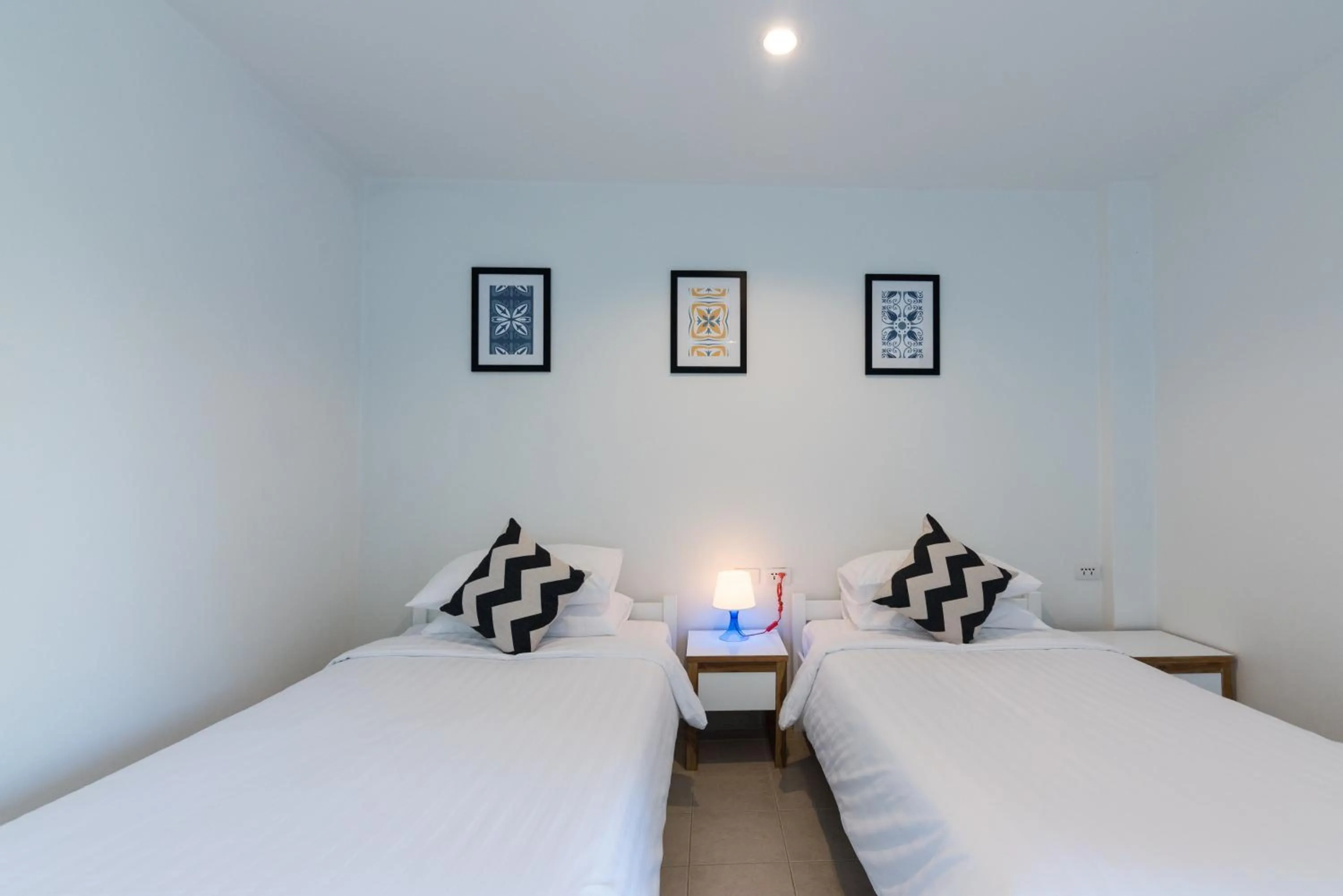 Bed in Maikhao Hotel, Phuket