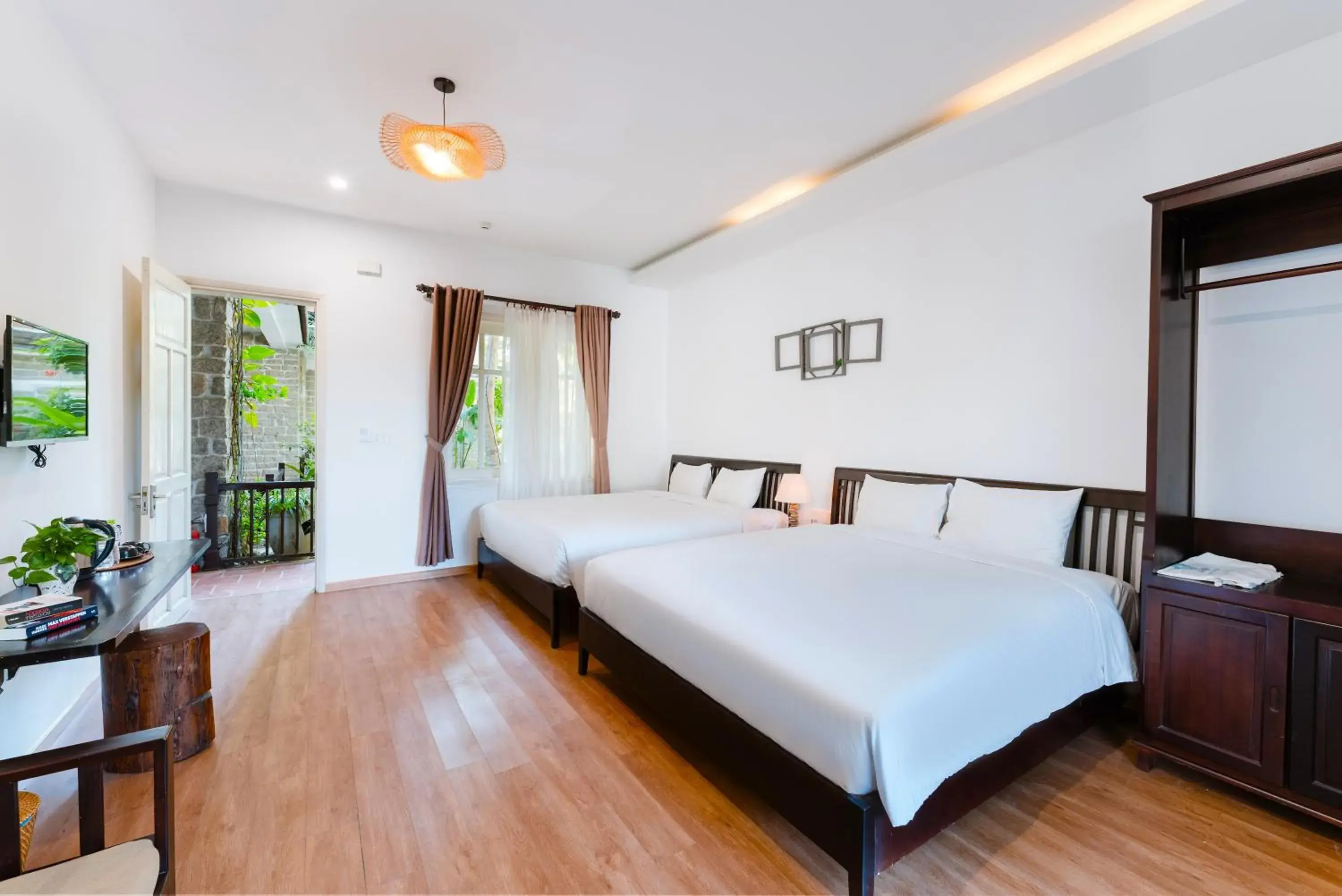 Quadruple Room with Garden View in Ancient Garden Boutique Hoi An Quadruple Room with Garden View in Ancient Garden Boutique Hoi An