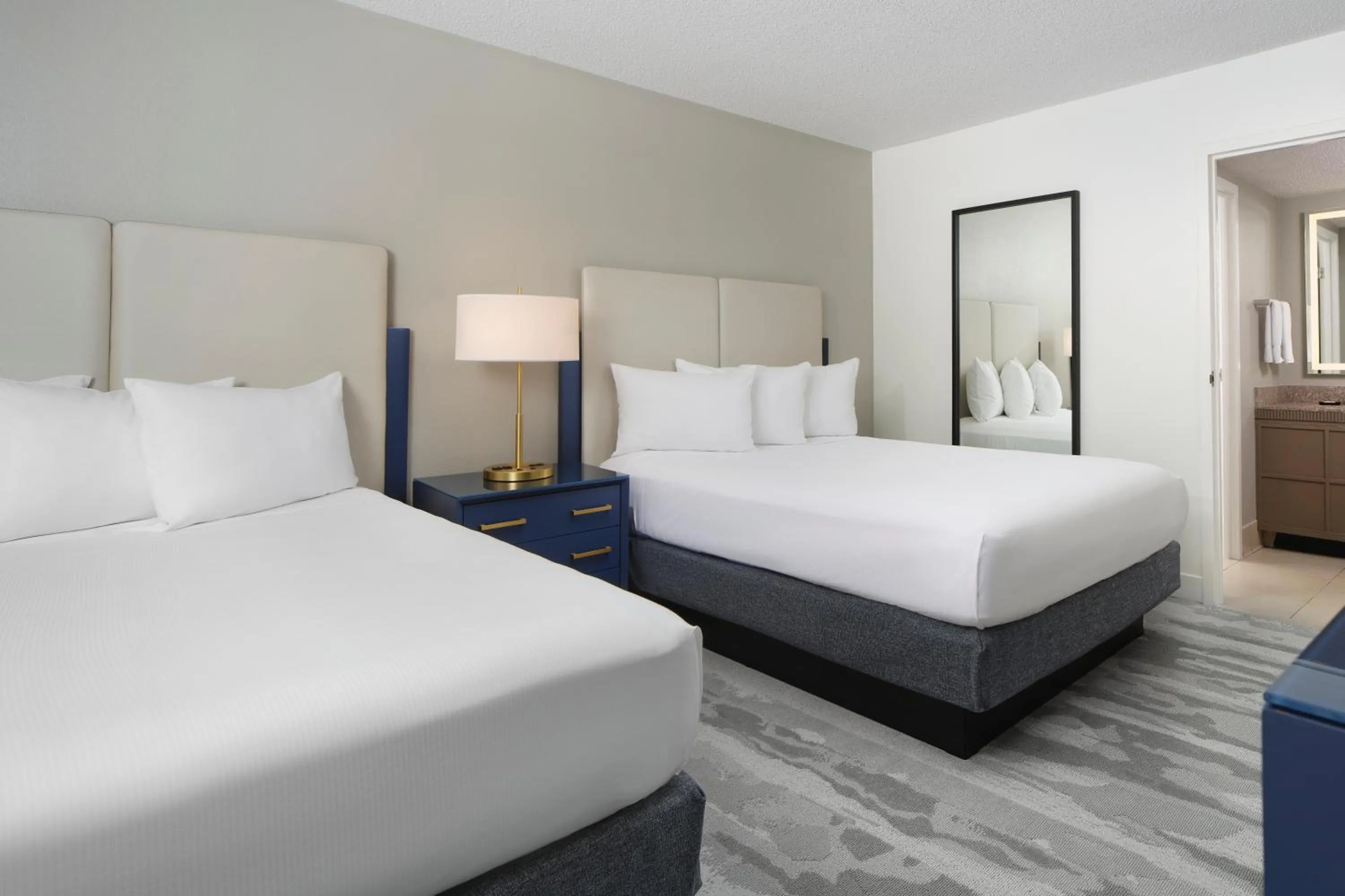 Bed in Embassy Suites by Hilton Myrtle Beach Oceanfront Resort