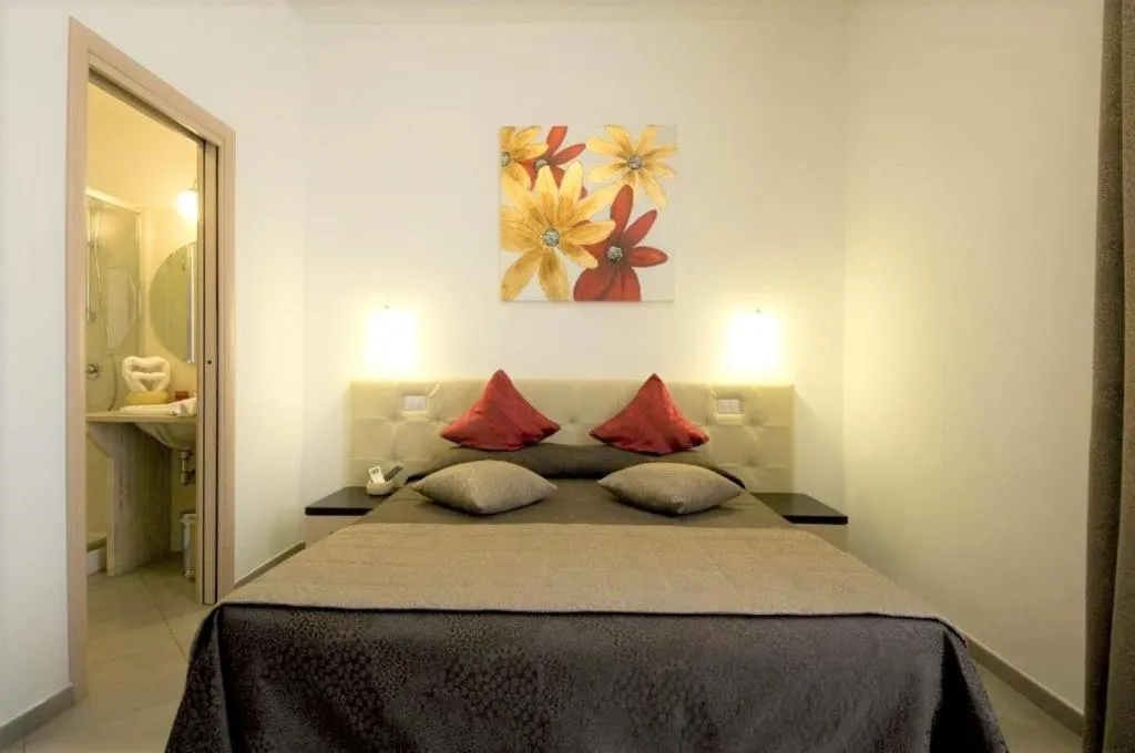 Bed in Ara Pacis Inn