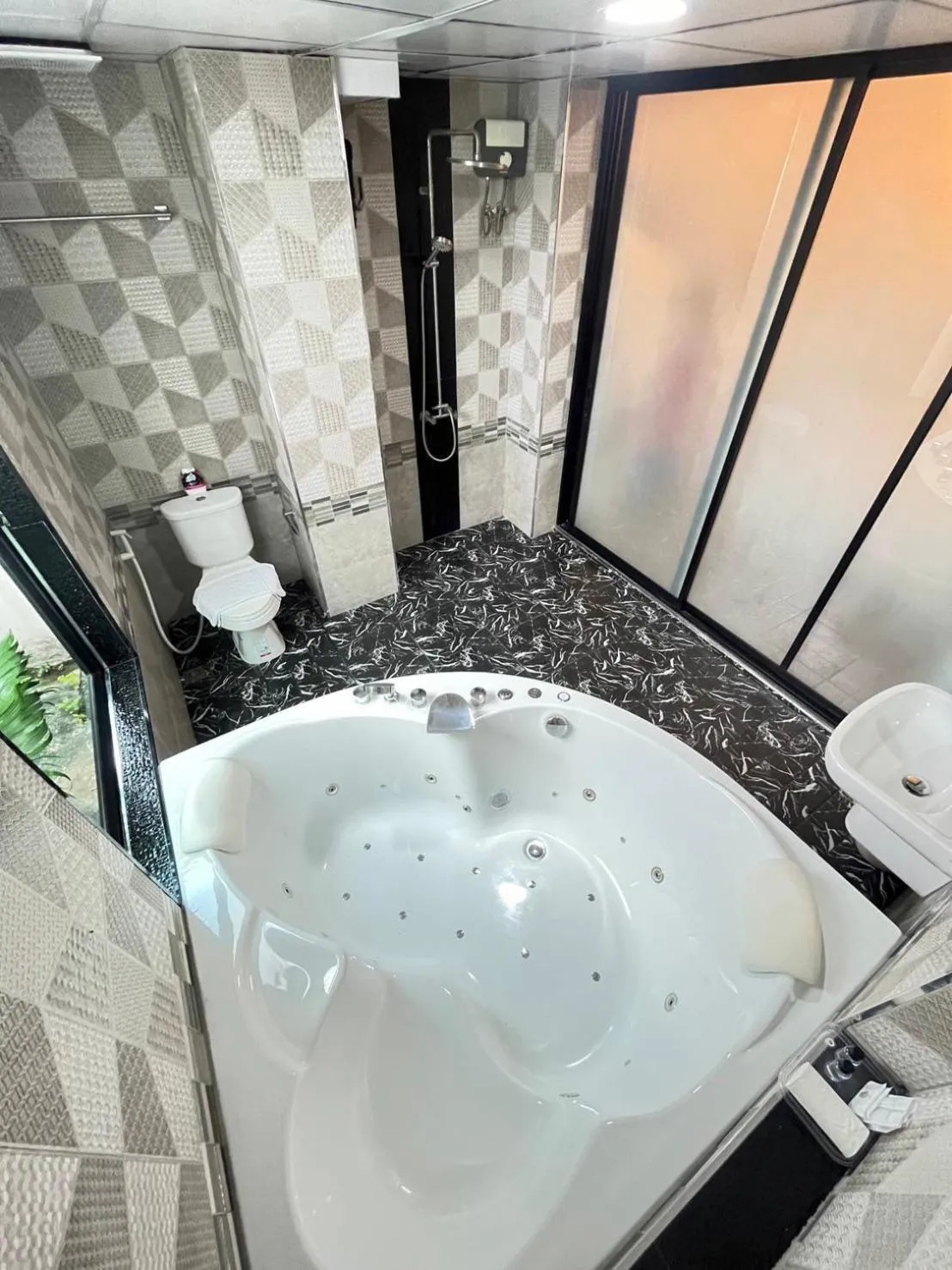 Bathroom in Sweetloft Hotel Don Muang