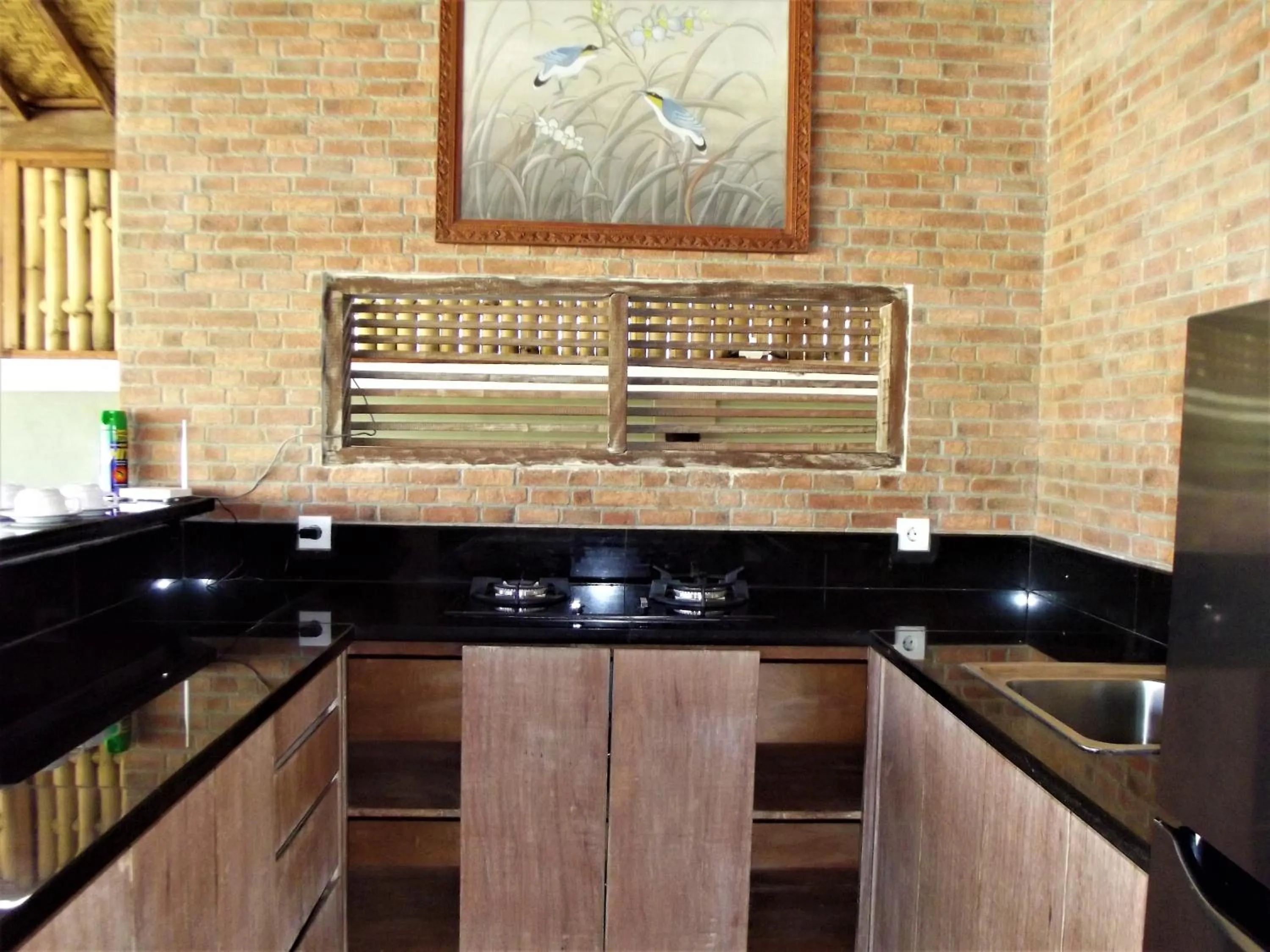 Communal kitchen in The Lakshmi Villas by The Beach House
