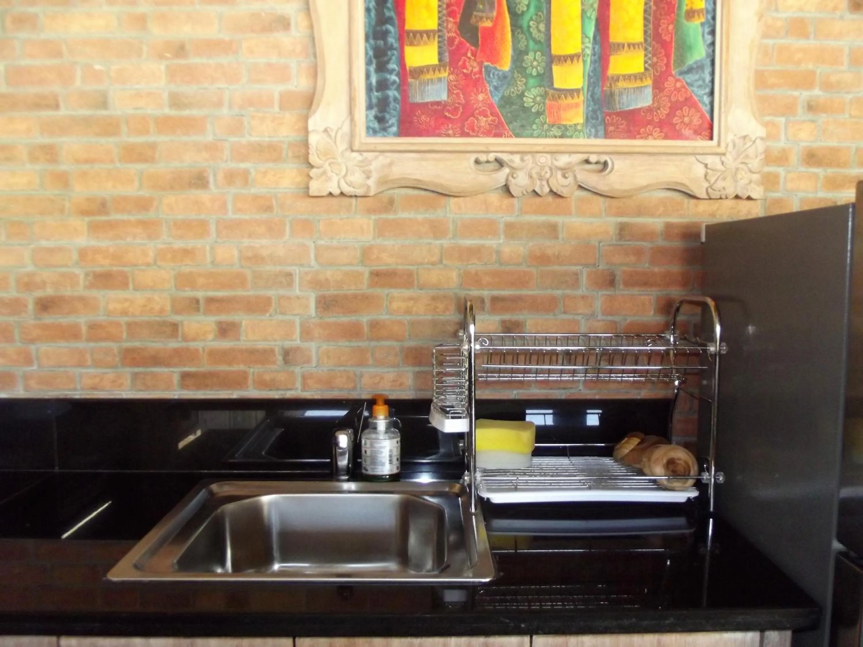 Communal kitchen in The Lakshmi Villas by The Beach House