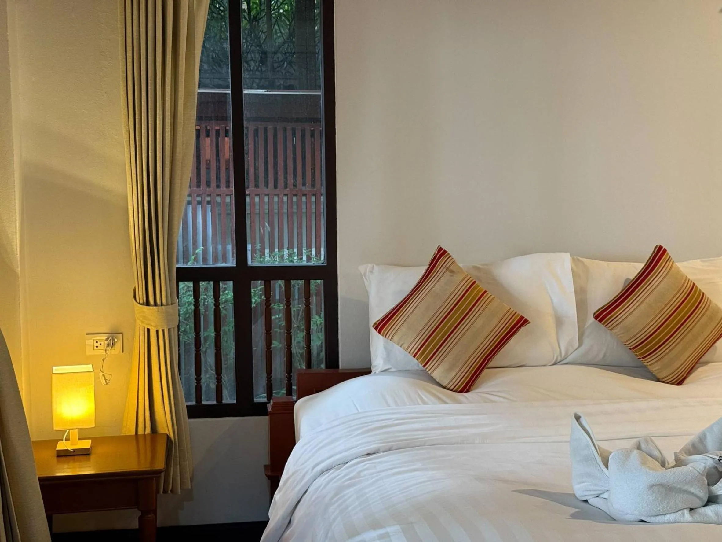 Bed in Bhundhari Chaweng Beach Resort Koh Samui - SHA Plus