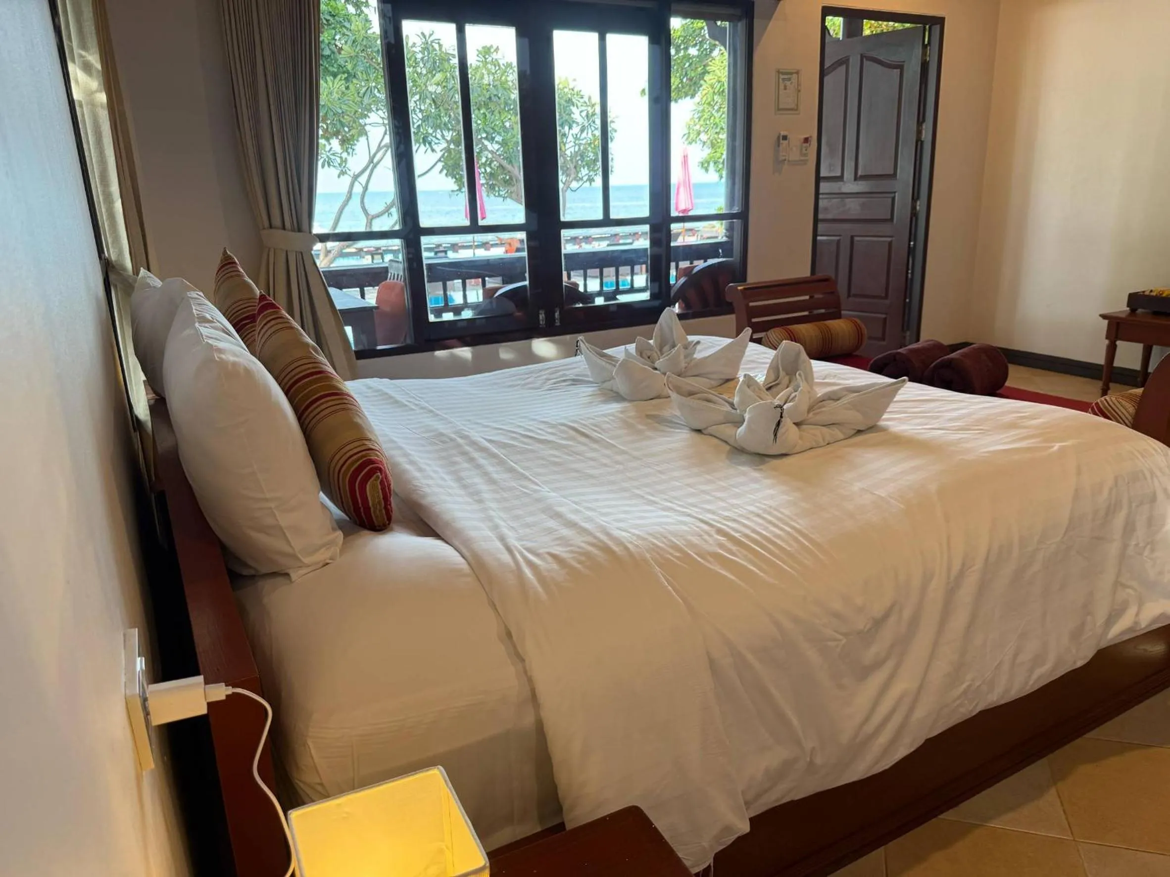 Bed in Bhundhari Chaweng Beach Resort Koh Samui - SHA Plus