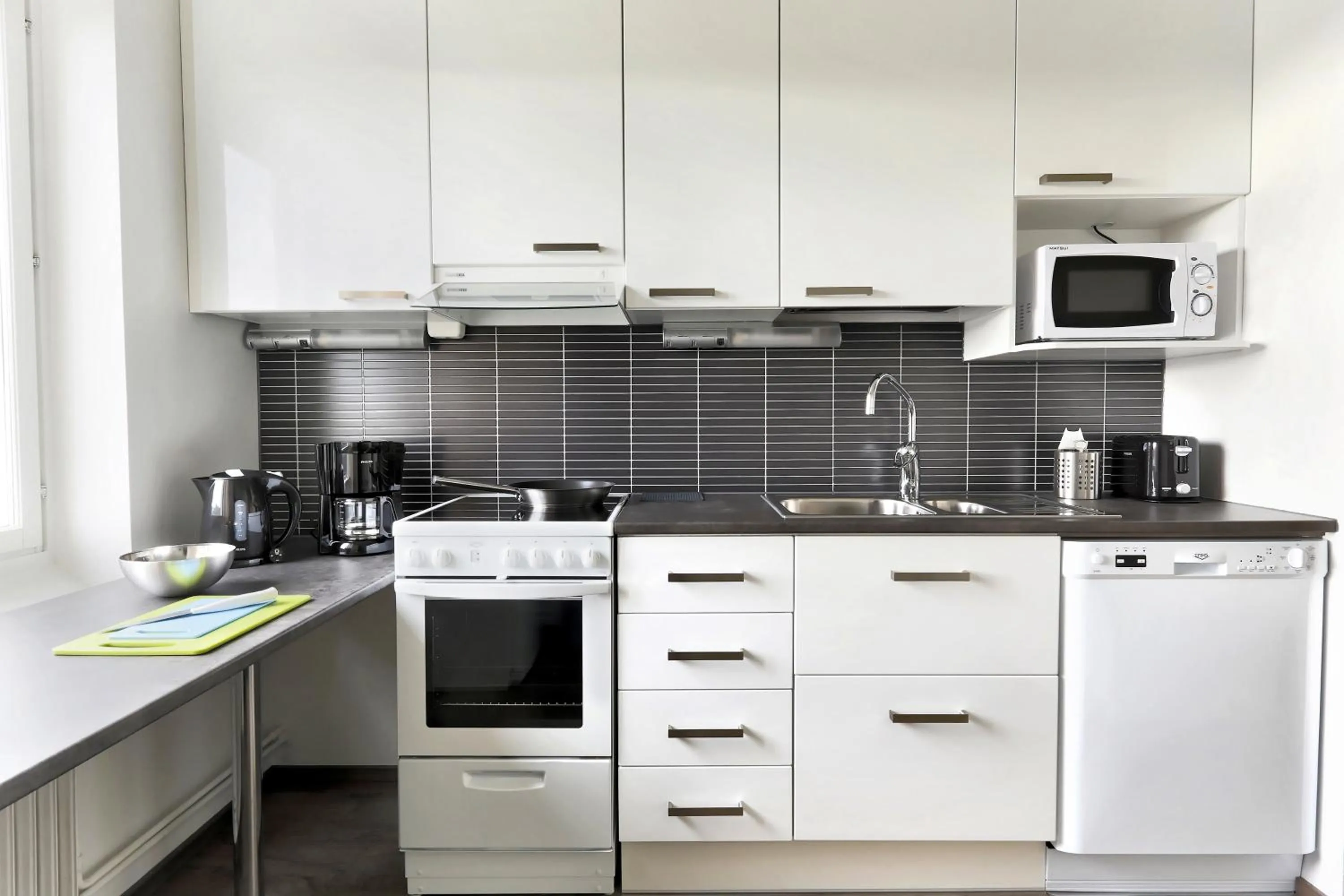 Kitchen or kitchenette in Forenom Serviced Apartments Helsinki Lapinlahdenkatu