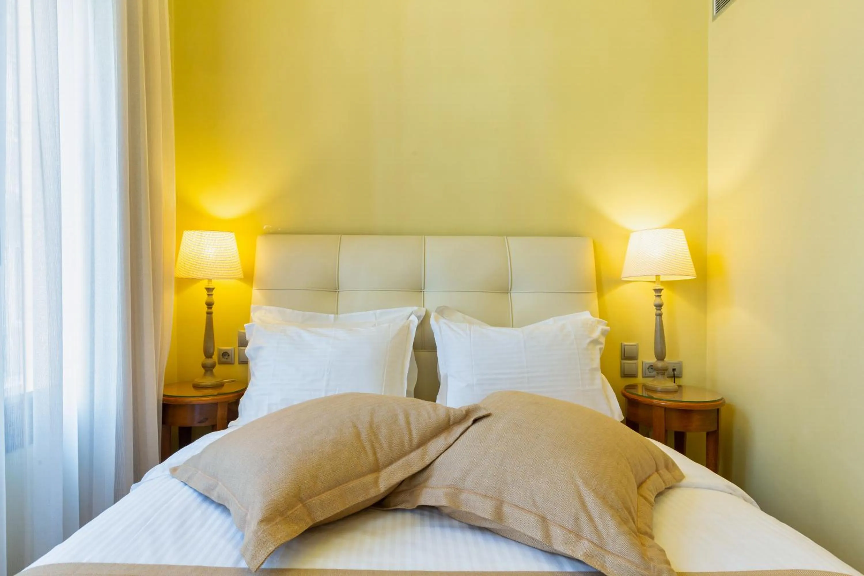 Bed in Sweet Home Hotel