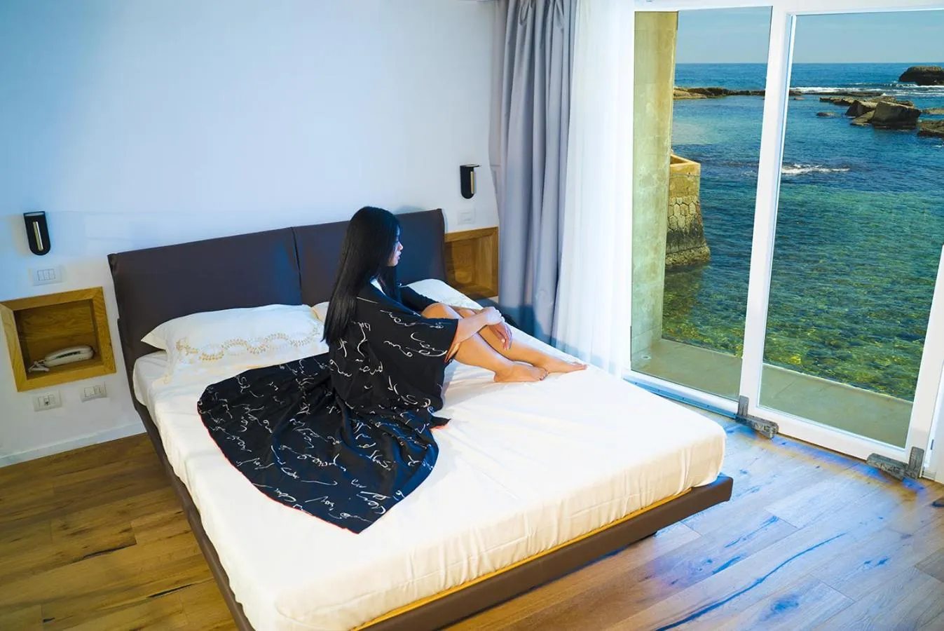 Bed in Re Dionisio Luxury Suites