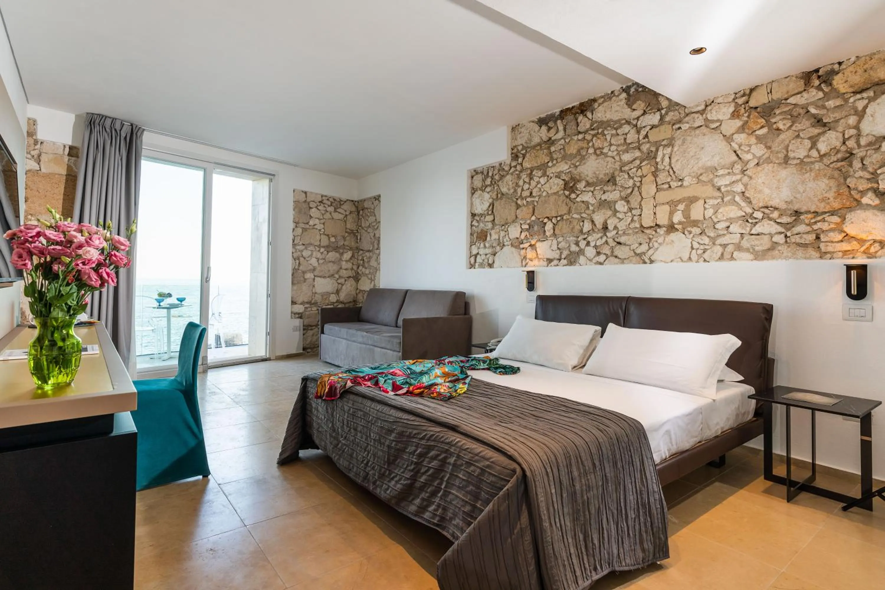 Bed in Re Dionisio Luxury Suites