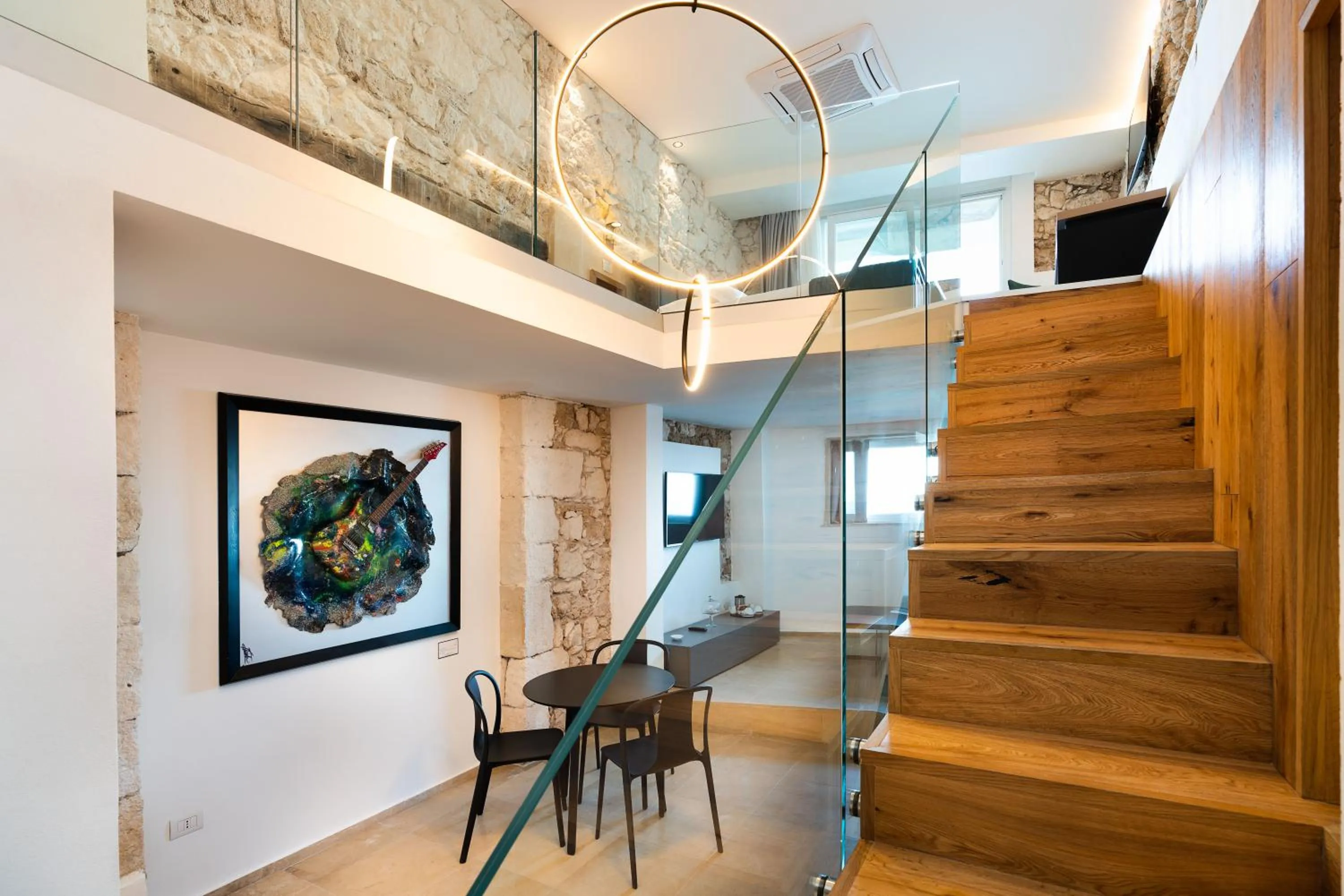 Bed in Re Dionisio Luxury Suites