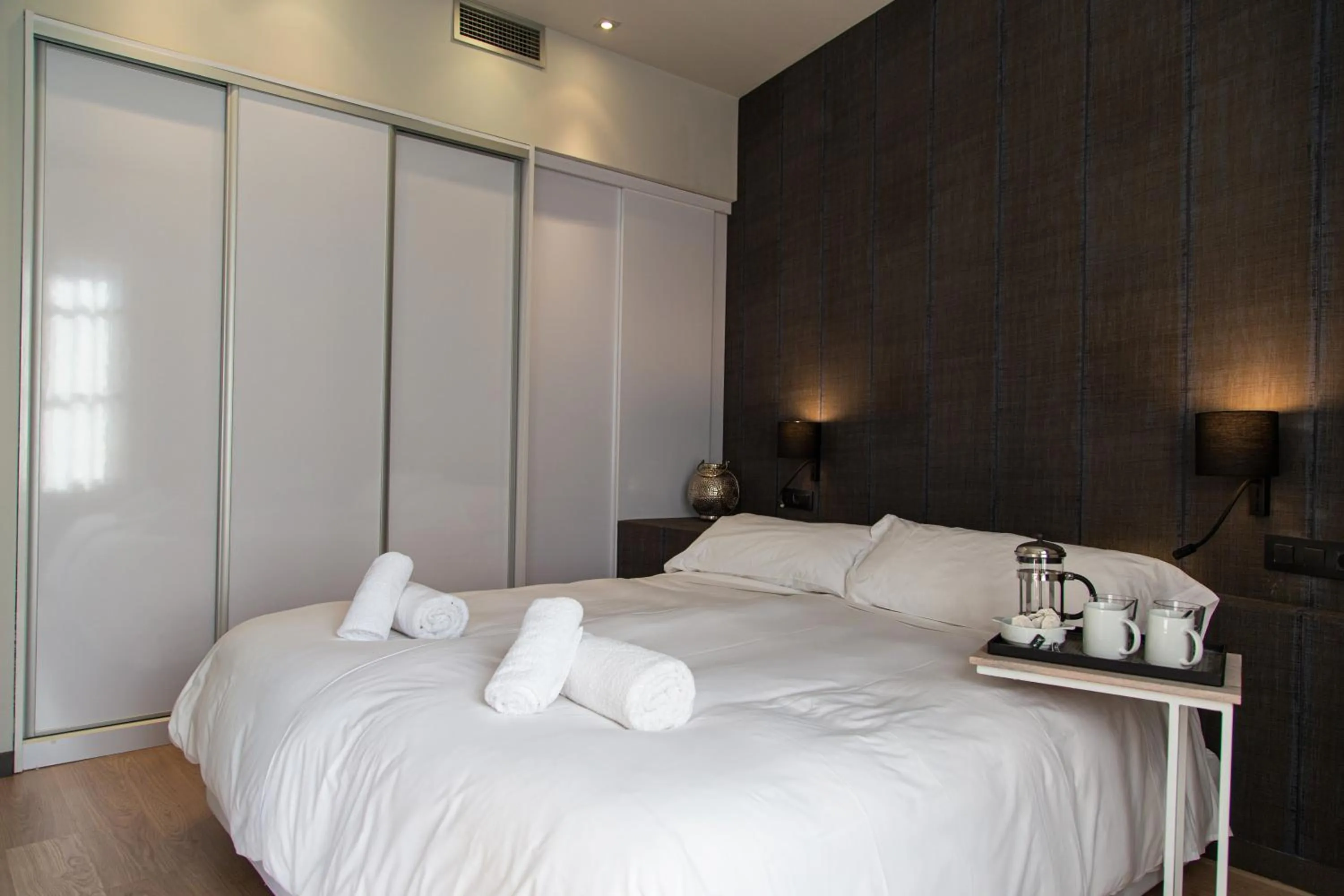 Bed in Inspired by EnjoyApartments