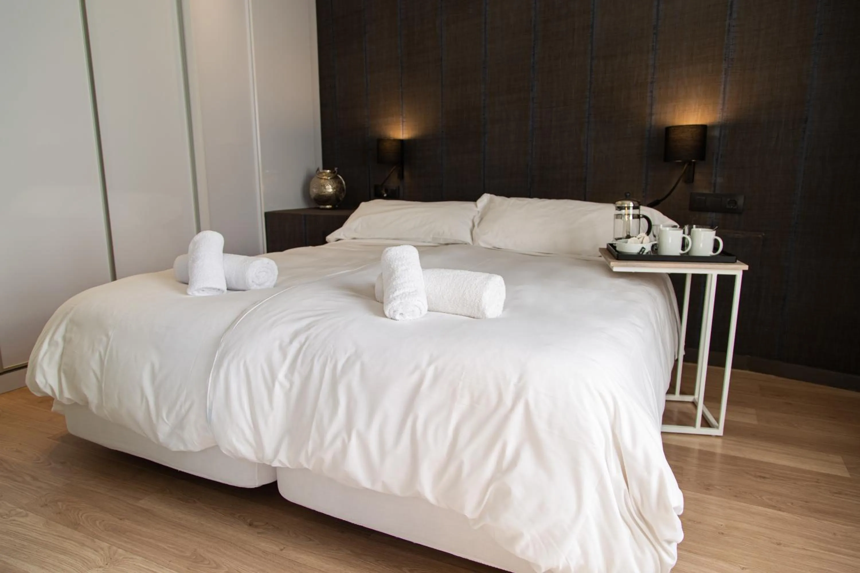 Bed in Inspired by EnjoyApartments